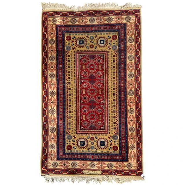 A 20th century Caucasus Kazak hand knotted wool signed floor...
