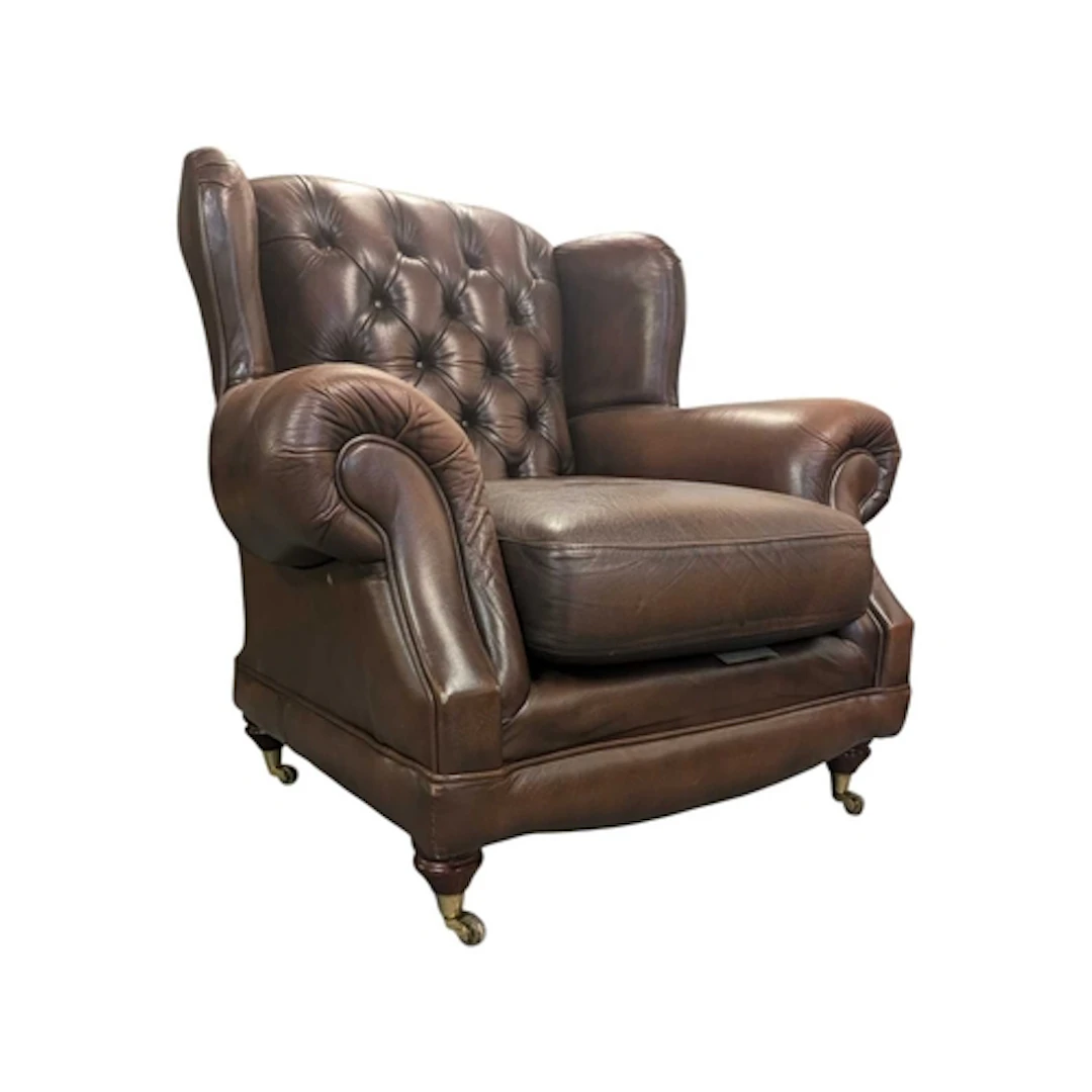Thomas Lloyd - A vintage 20th century brown leather chesterf...