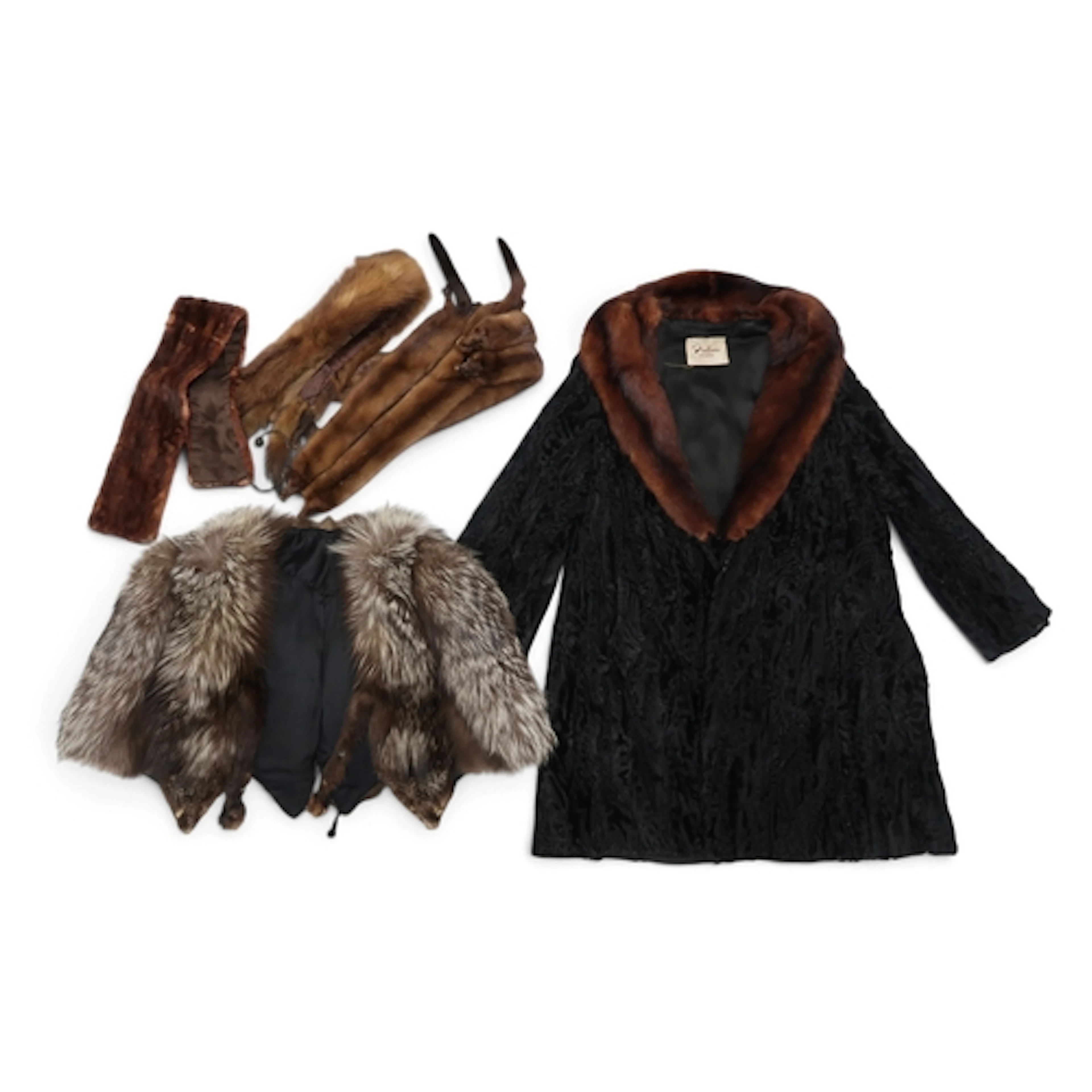 An Astrakhan Persian lamb coat with fur collar, a silver fox...