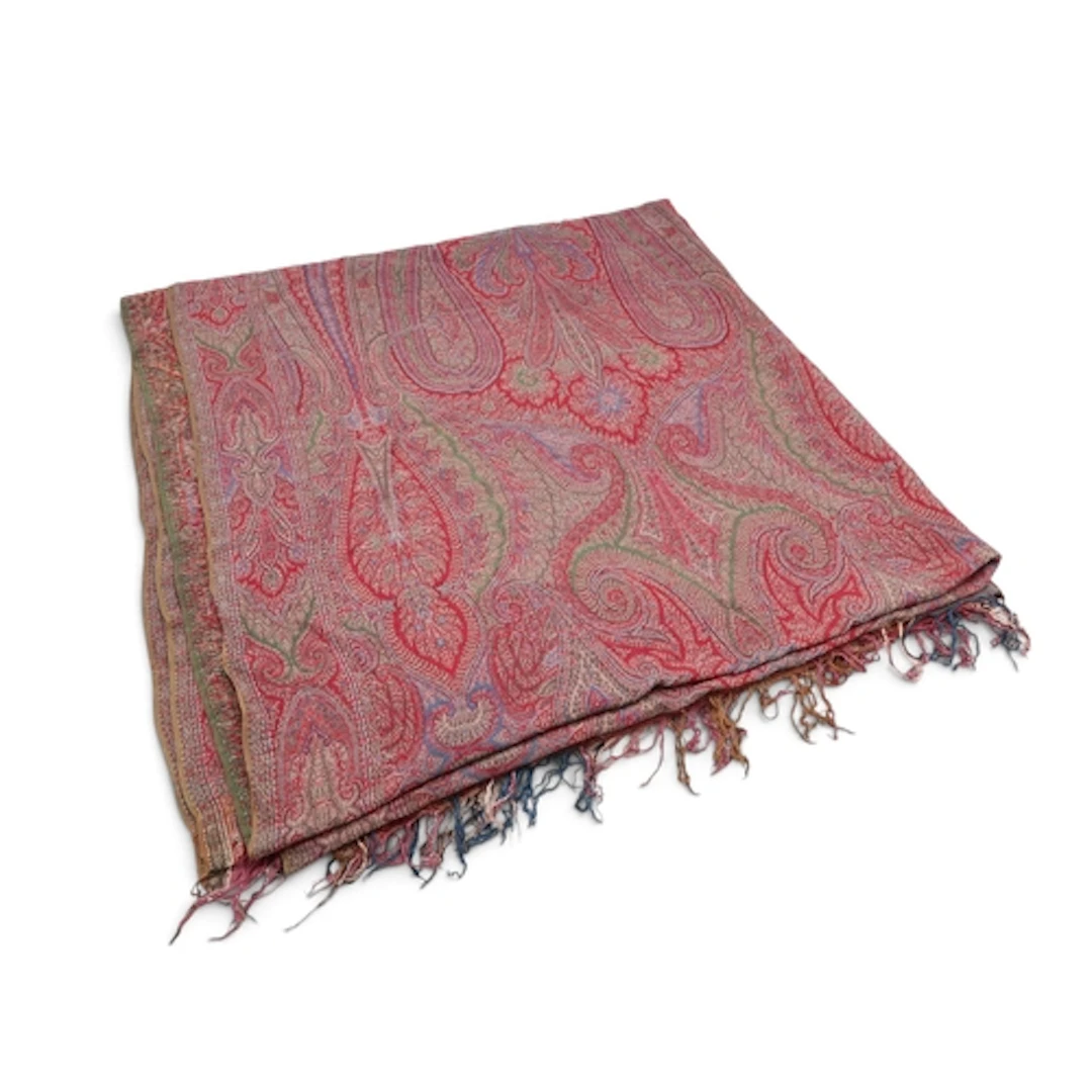 A Paisley shawl woven with elongated boteh, palmettes and sp...