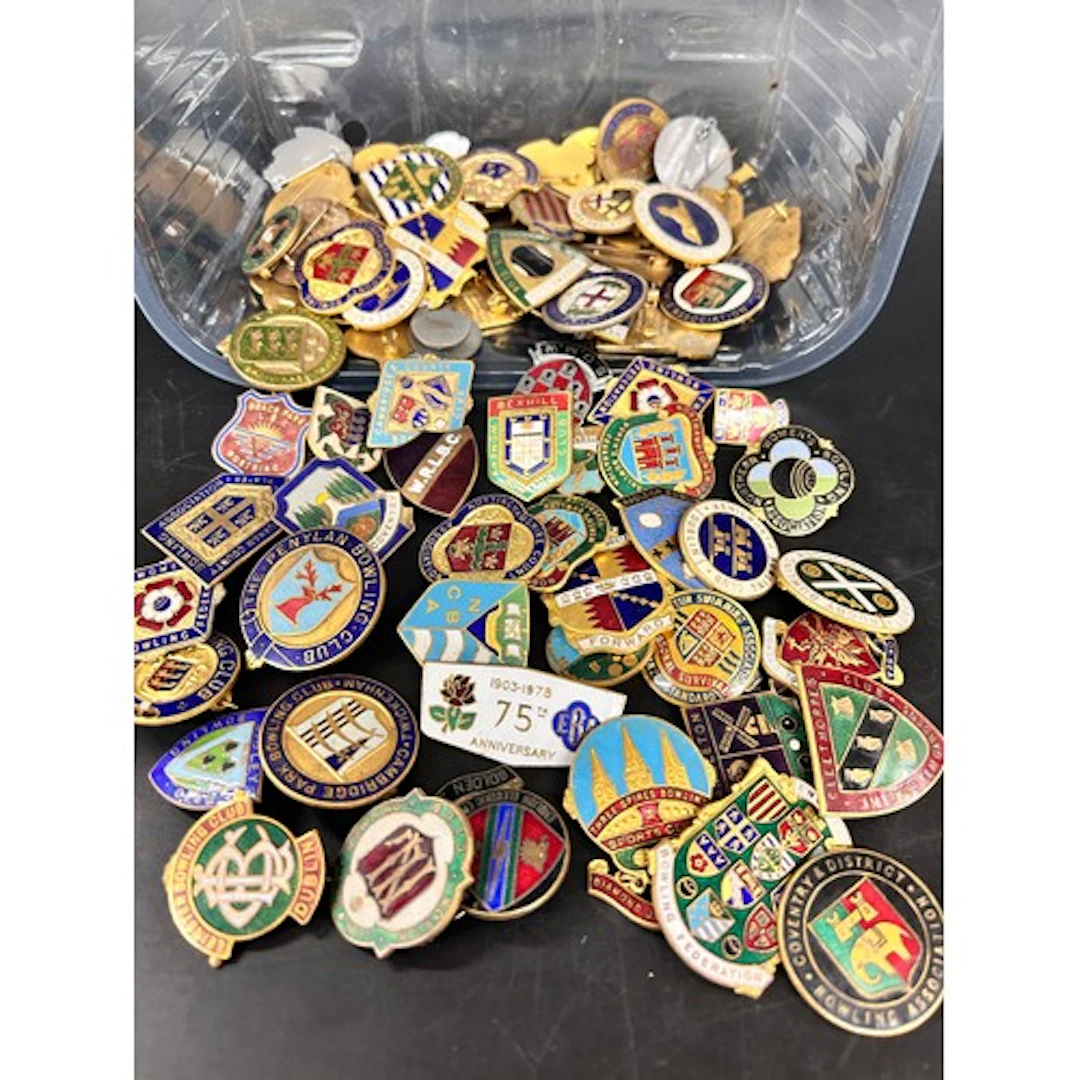 Approximately 90 bowling badges