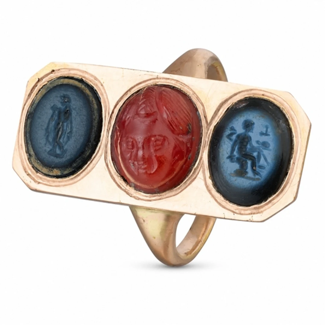 An impressive Georgian style ring in unmarked rose-gold, set...