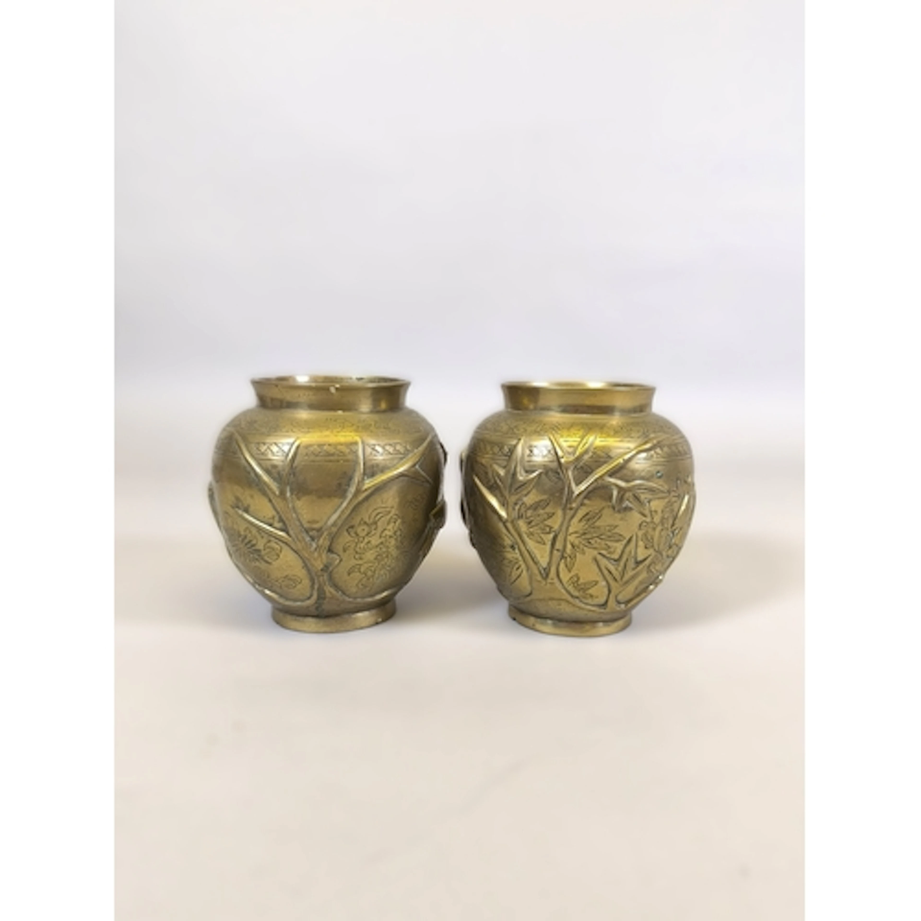 Pair of Chinese bronze vases each modelled in relief with ra...