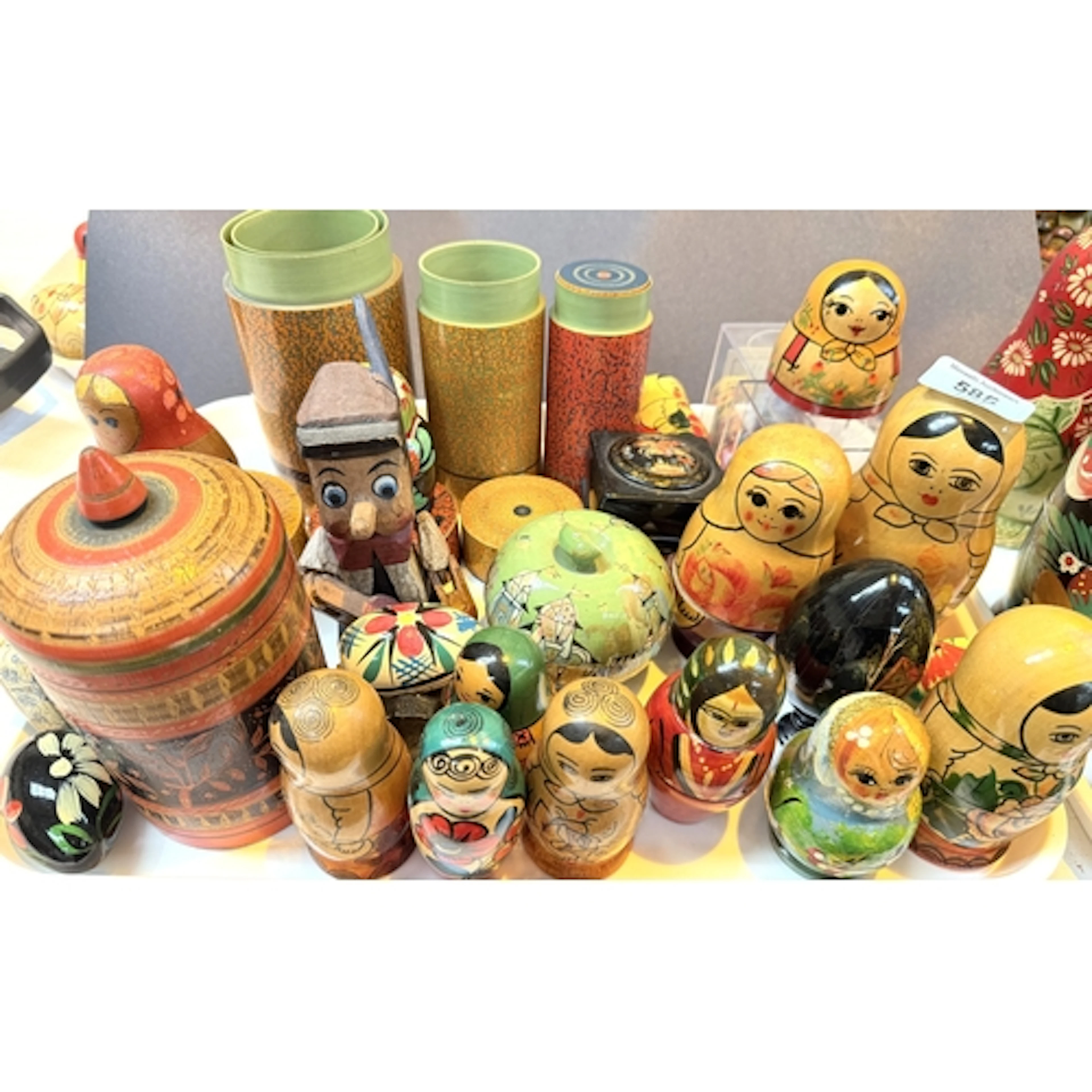 A collection of Russian Matryoshka wooden nests of dolls, bo...