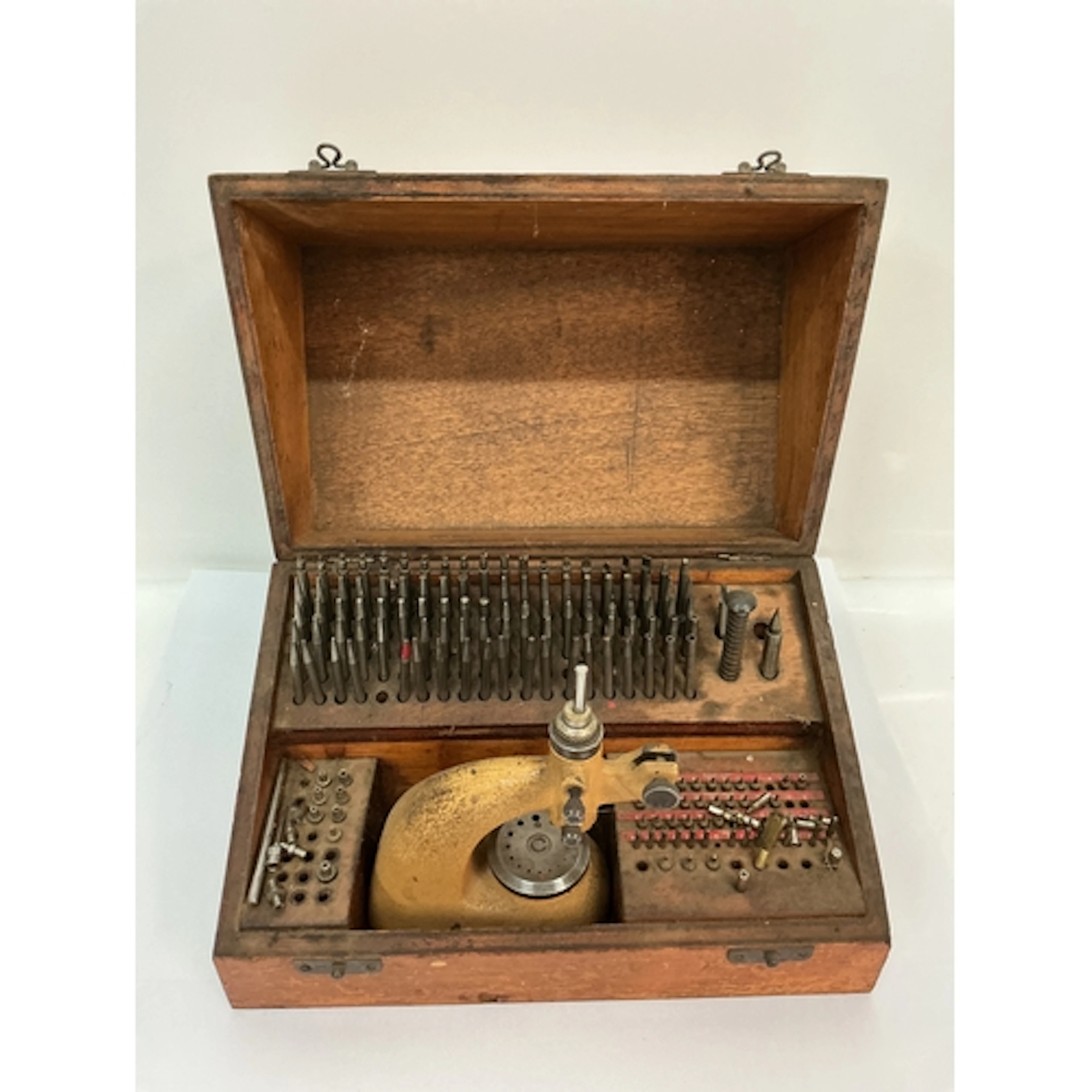 A watchmaker’s antique staking kit. Approx: 17 x 27cm