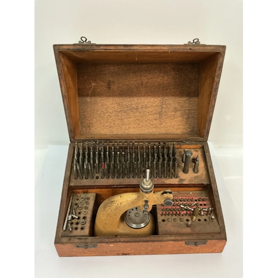A watchmaker’s antique staking kit. Approx: 17 x 27cm