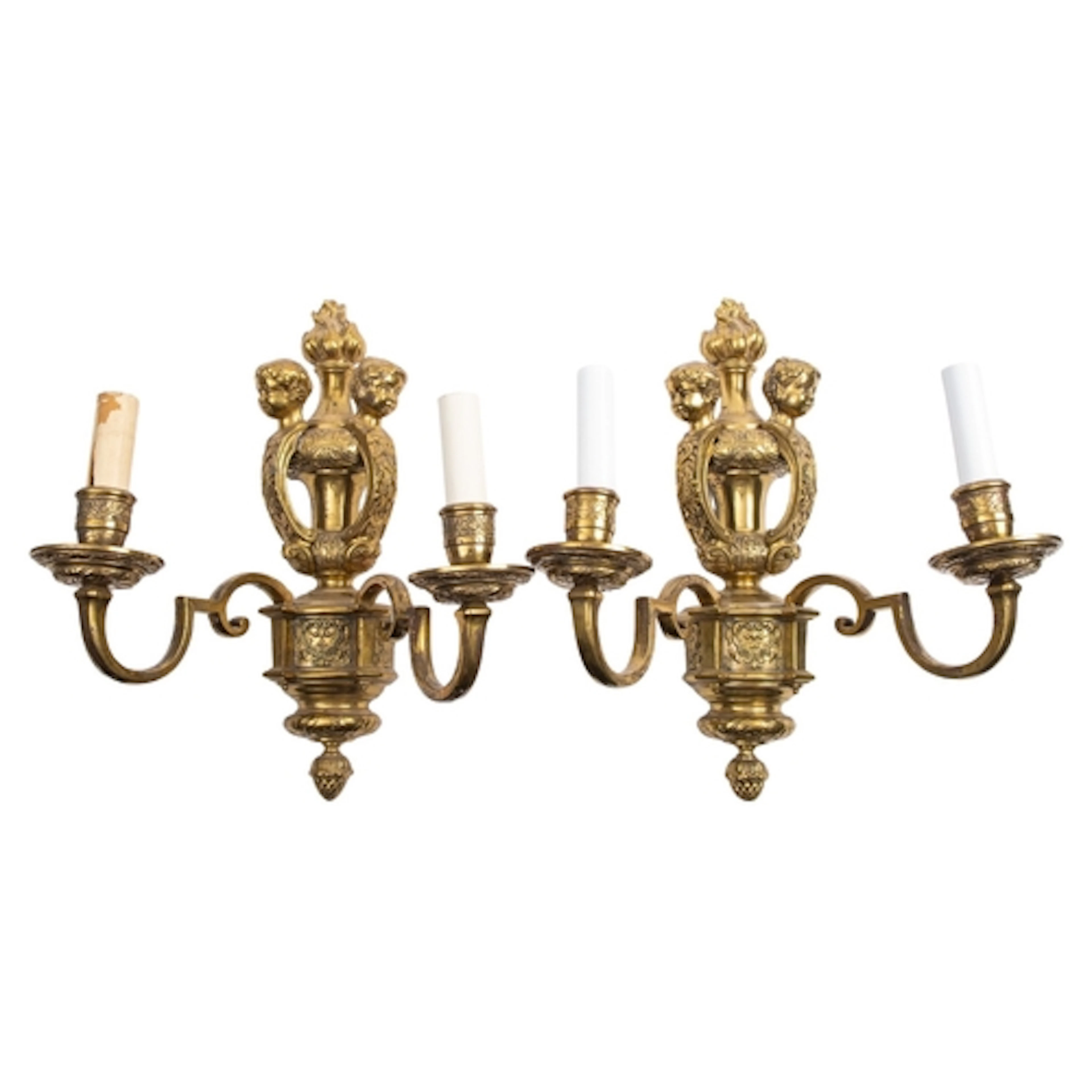 A pair of gilt bronze twin-light wall appliques in Régence s...