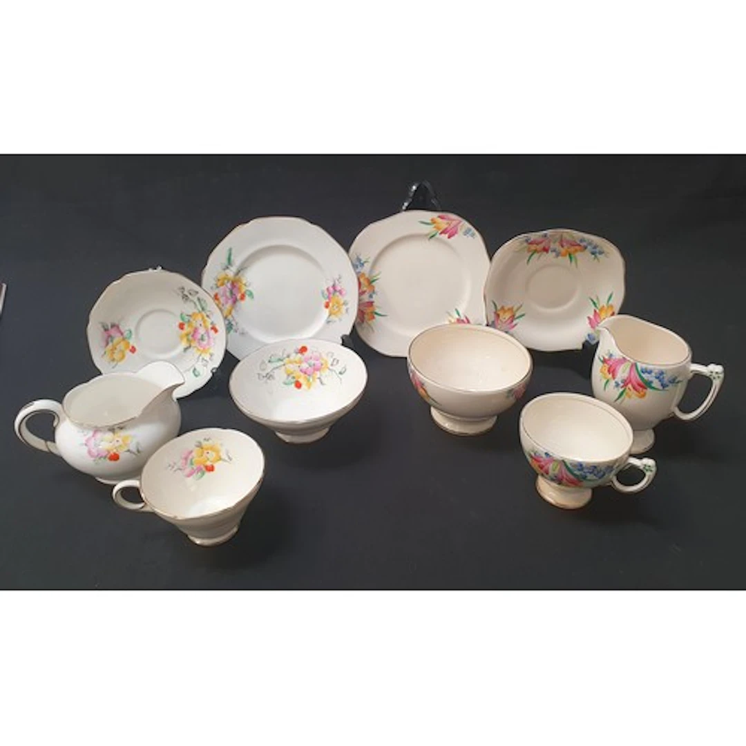 PARAGON PART TEA SET comprising eleven cups, twelve saucers,...