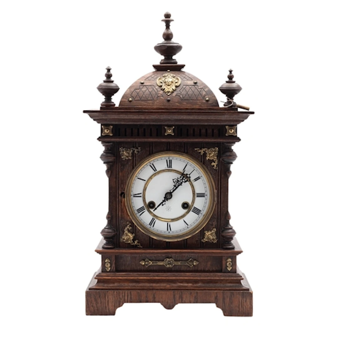 Junghans, Germany an oak mantel clock the eight-day duration...