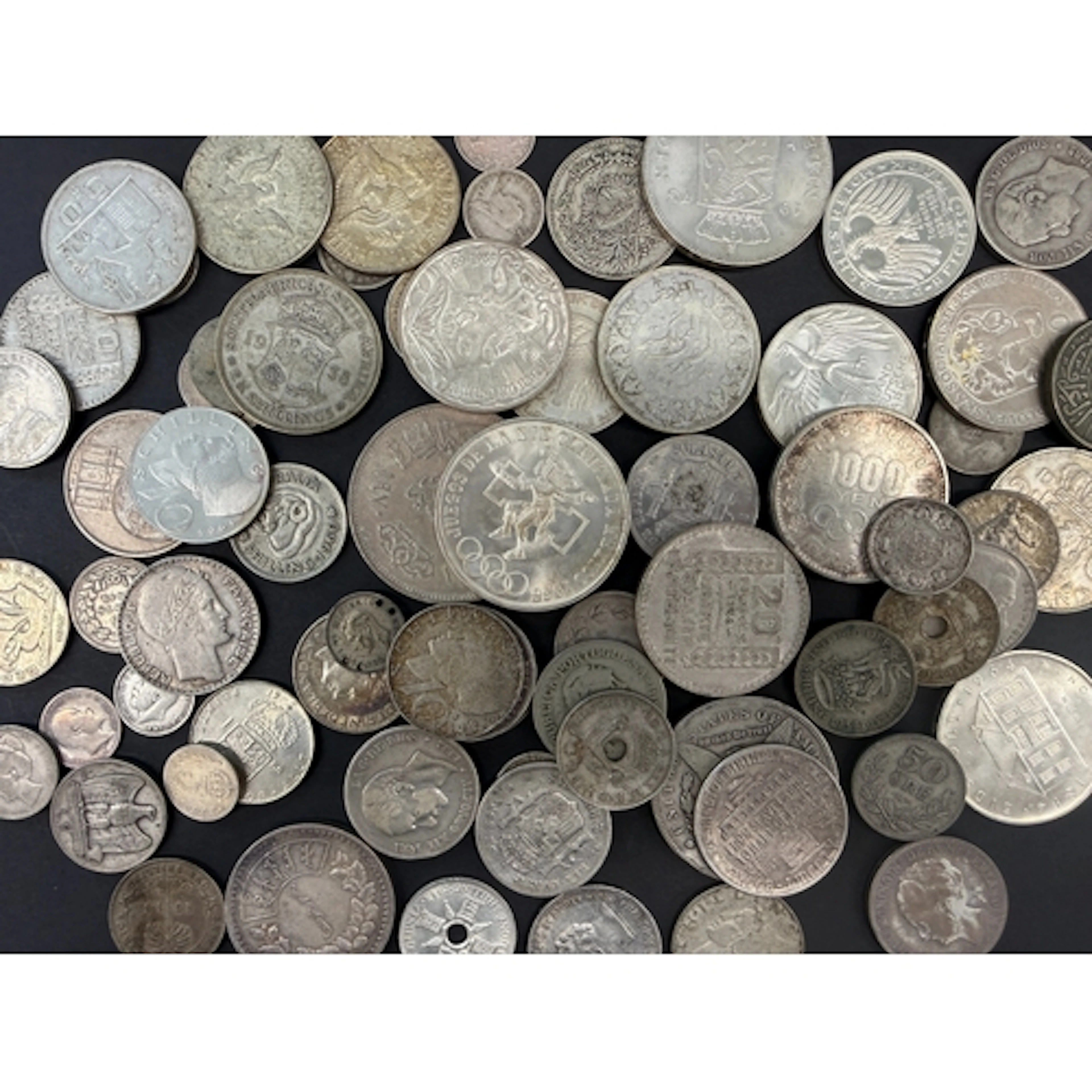 A group of mainly 20th Century World circulated silver coins...