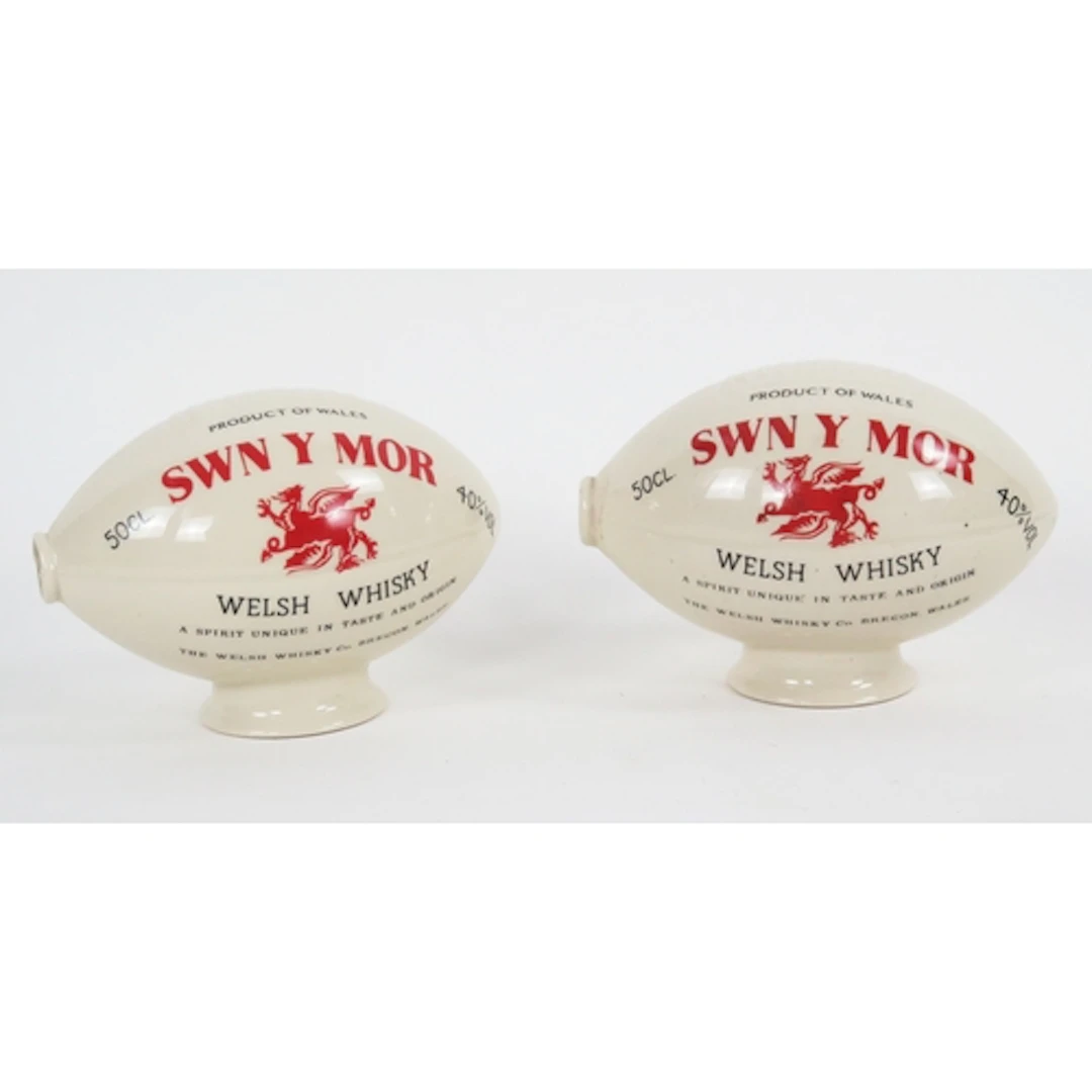 "Swn Y Mor" Welsh Whisky - two pottery advertising rugby bal...