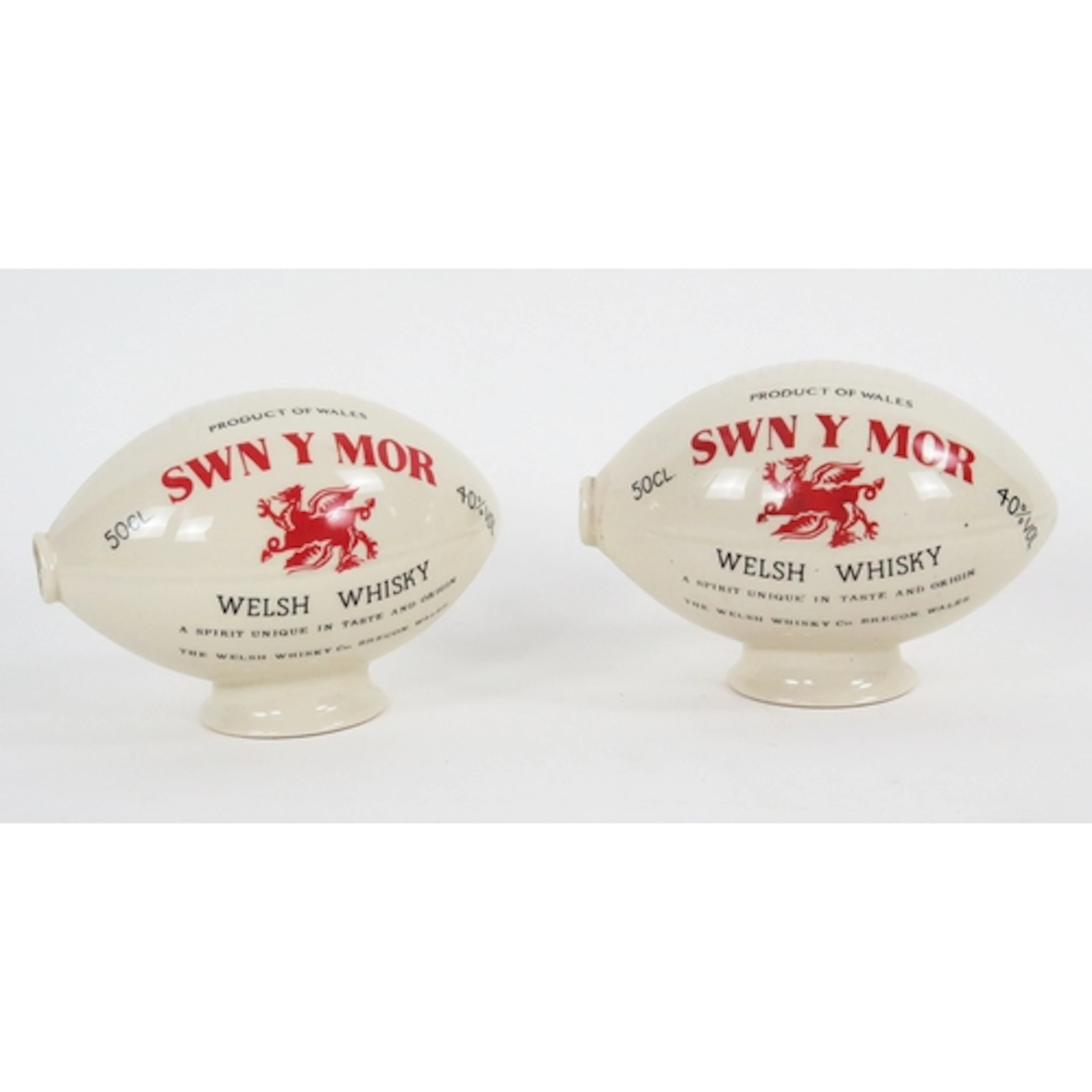 "Swn Y Mor" Welsh Whisky - two pottery advertising rugby bal...