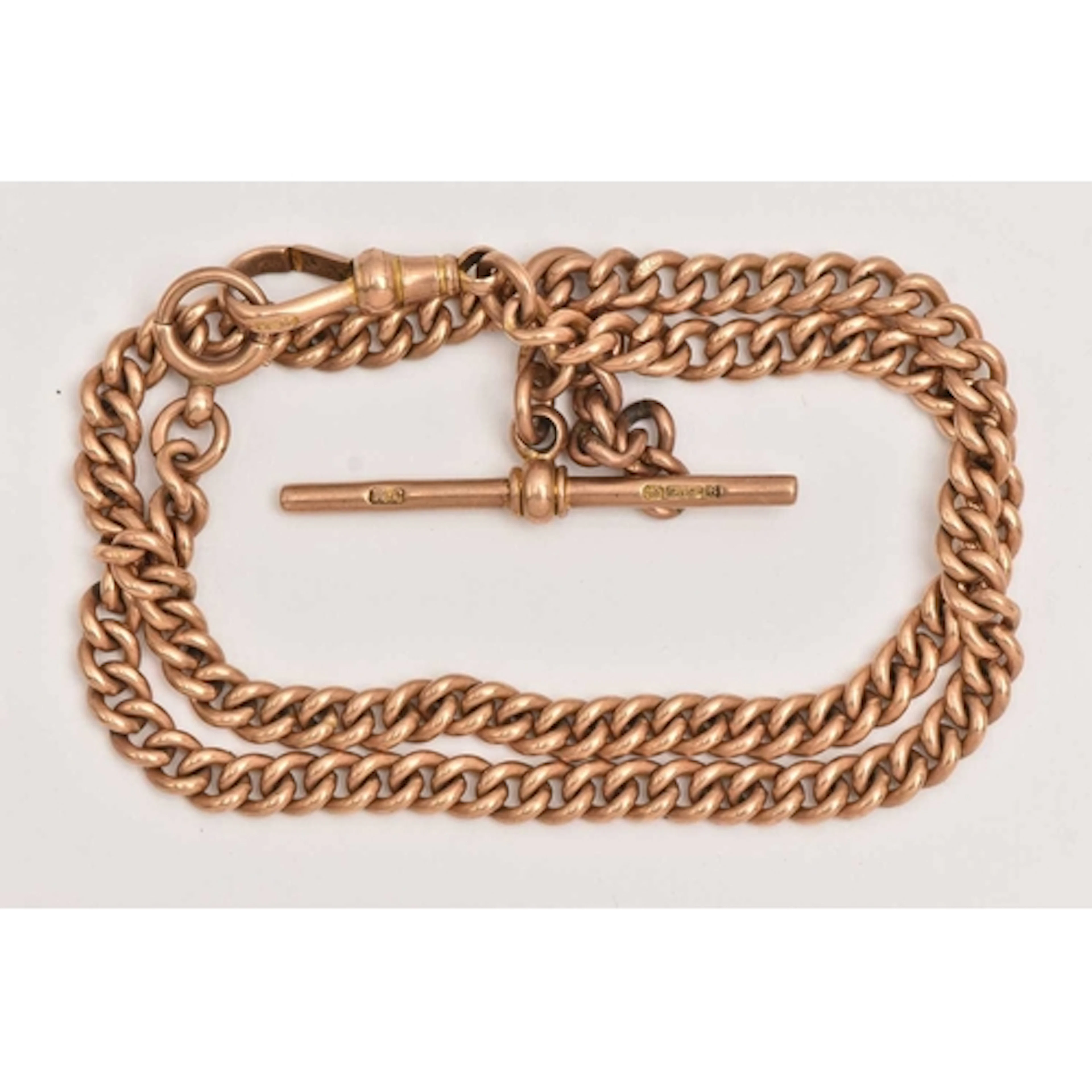 A 9CT GOLD DOUBLE ALBERT CHAIN. curb links stamped 9.375, fi...