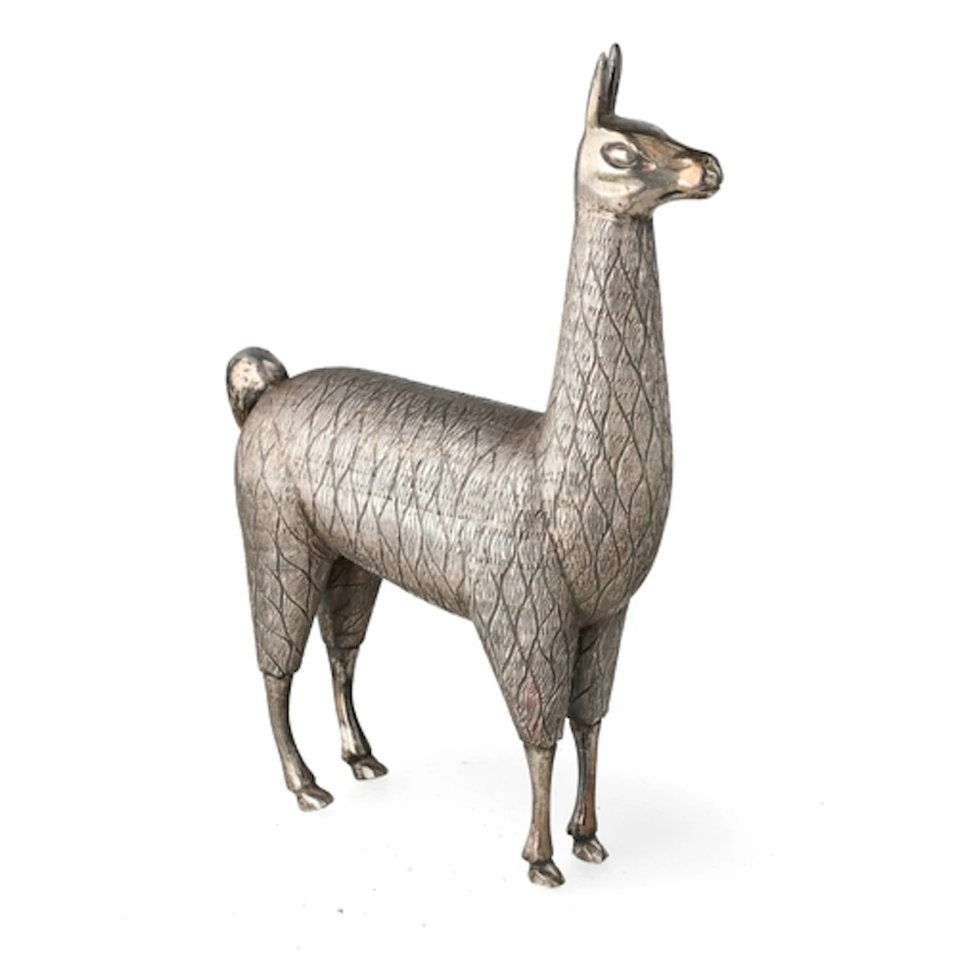 A PERUVIAN SOUTH AMERICAN SILVER MODEL OF A LLAMA 16cm Heigh...