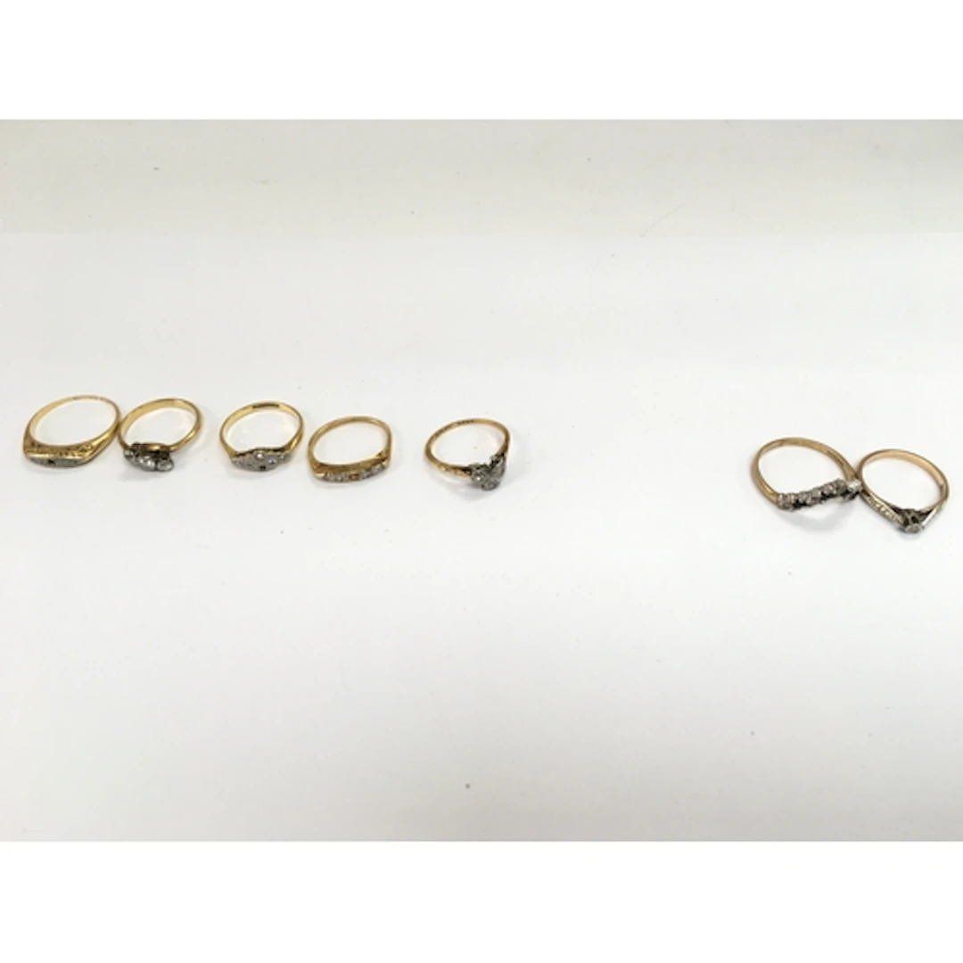 A collection of 7 stone set rings including 5 18ct gold 11.2...