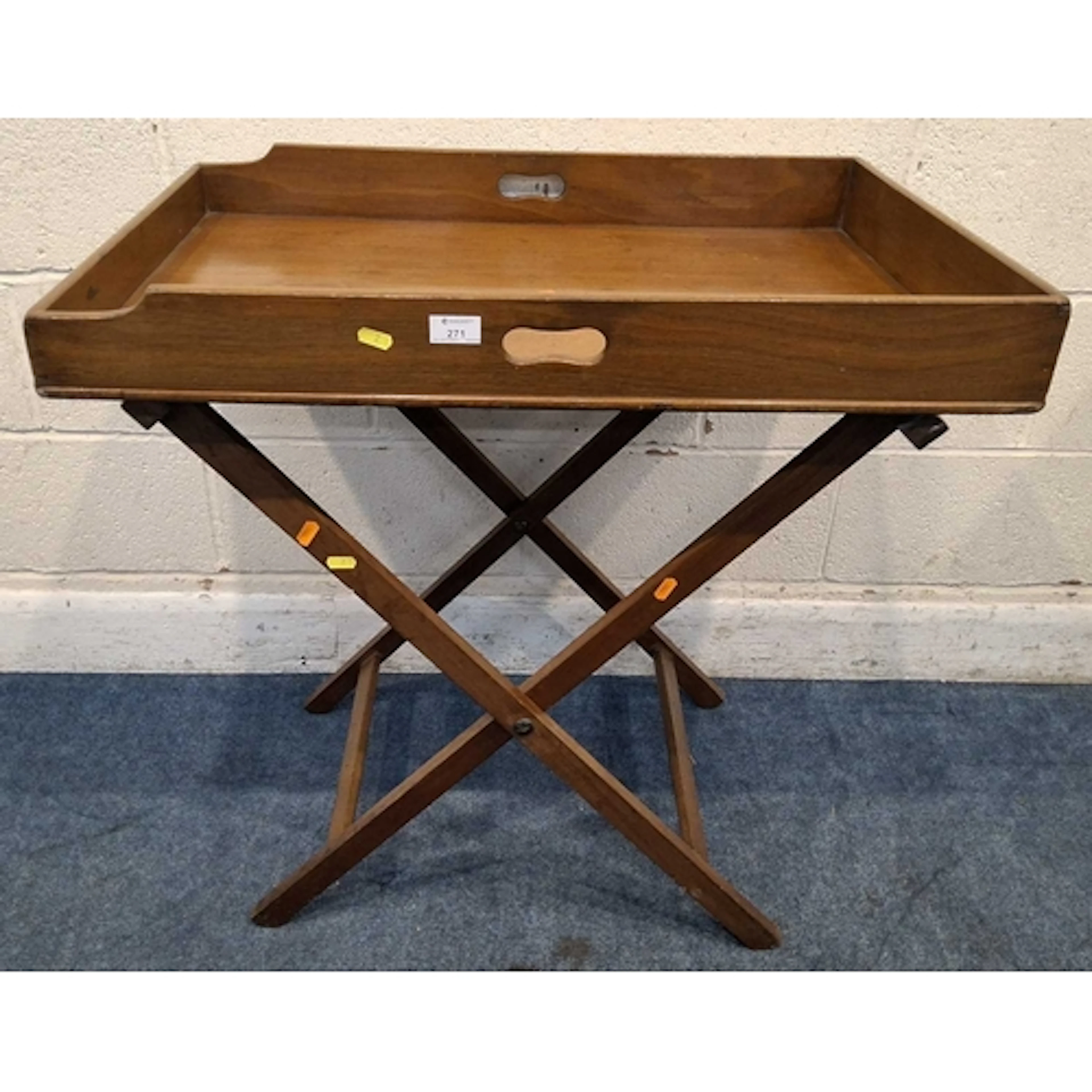 A MAHOGANY TRAY TABLE, raised on a folding cross frame (wid...