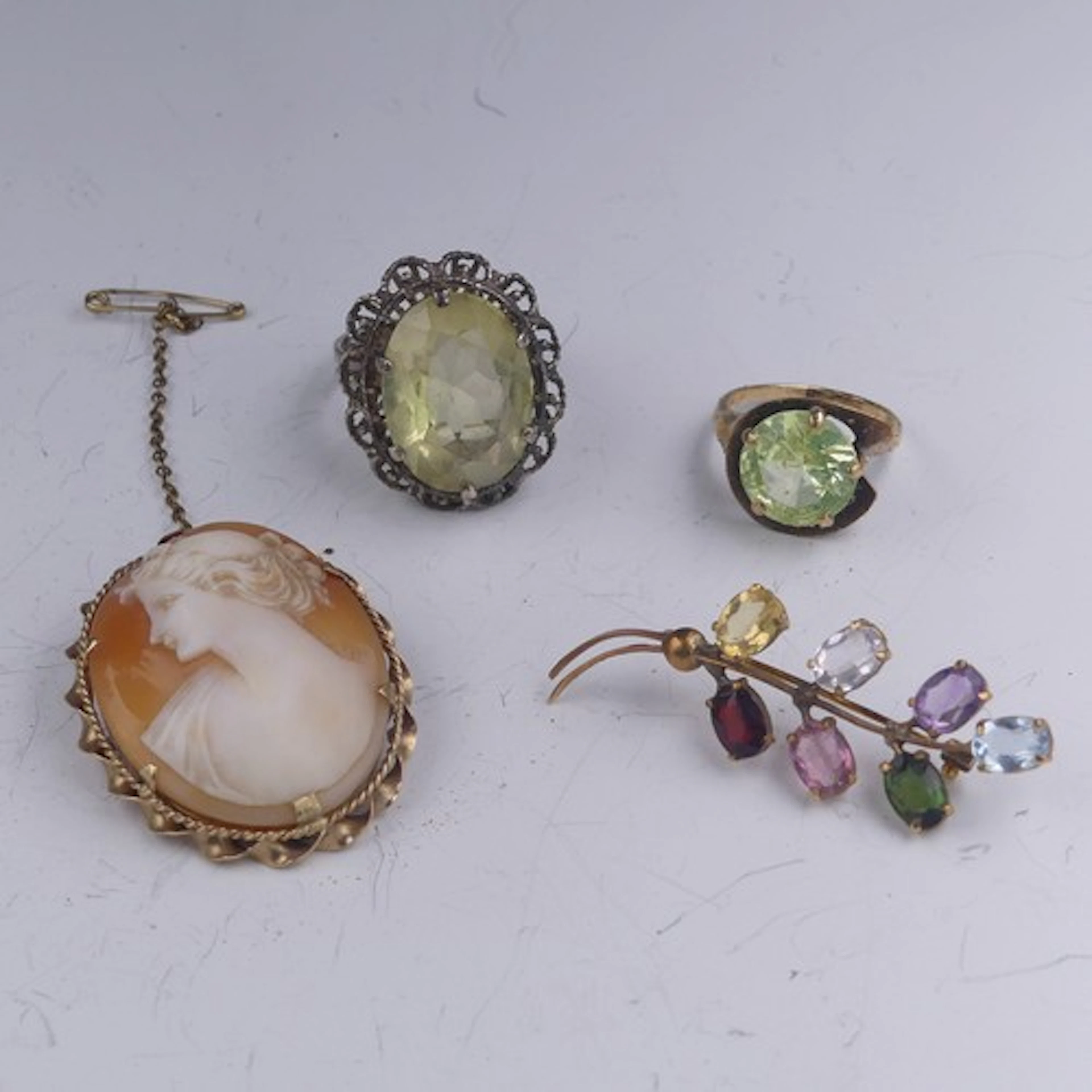 A 9ct gold oval shell Cameo Brooch, 4cm long, 8.7g, a synthe...