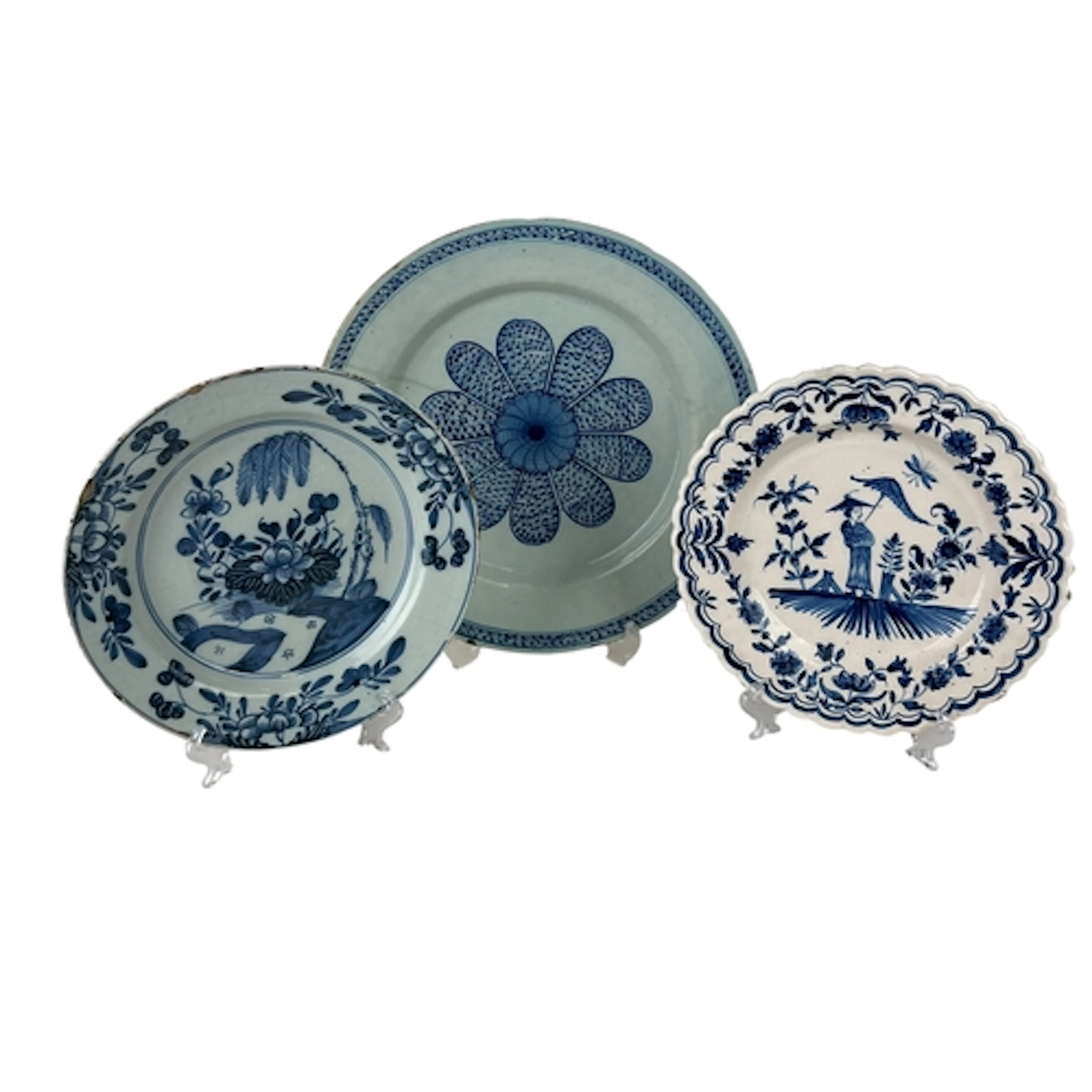 THREE DELFTWARE PLATES OF VARYING SIZES Largest: 35cm...
