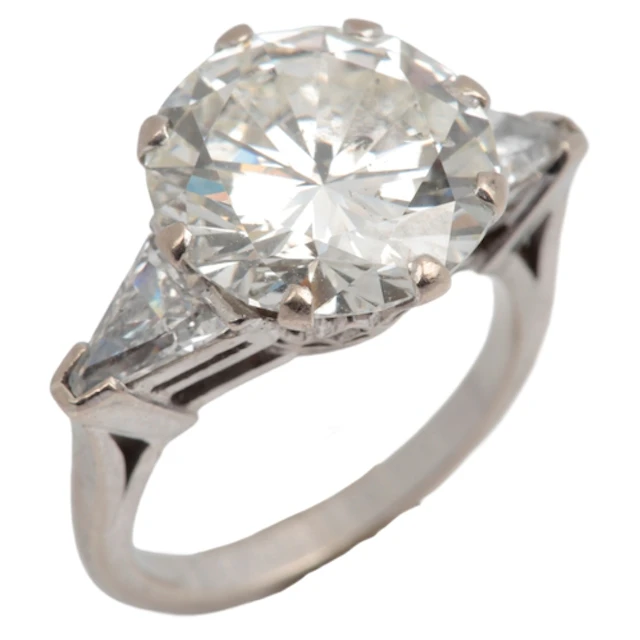 An impressive diamond ring, claw-set with a brilliant-cut di...