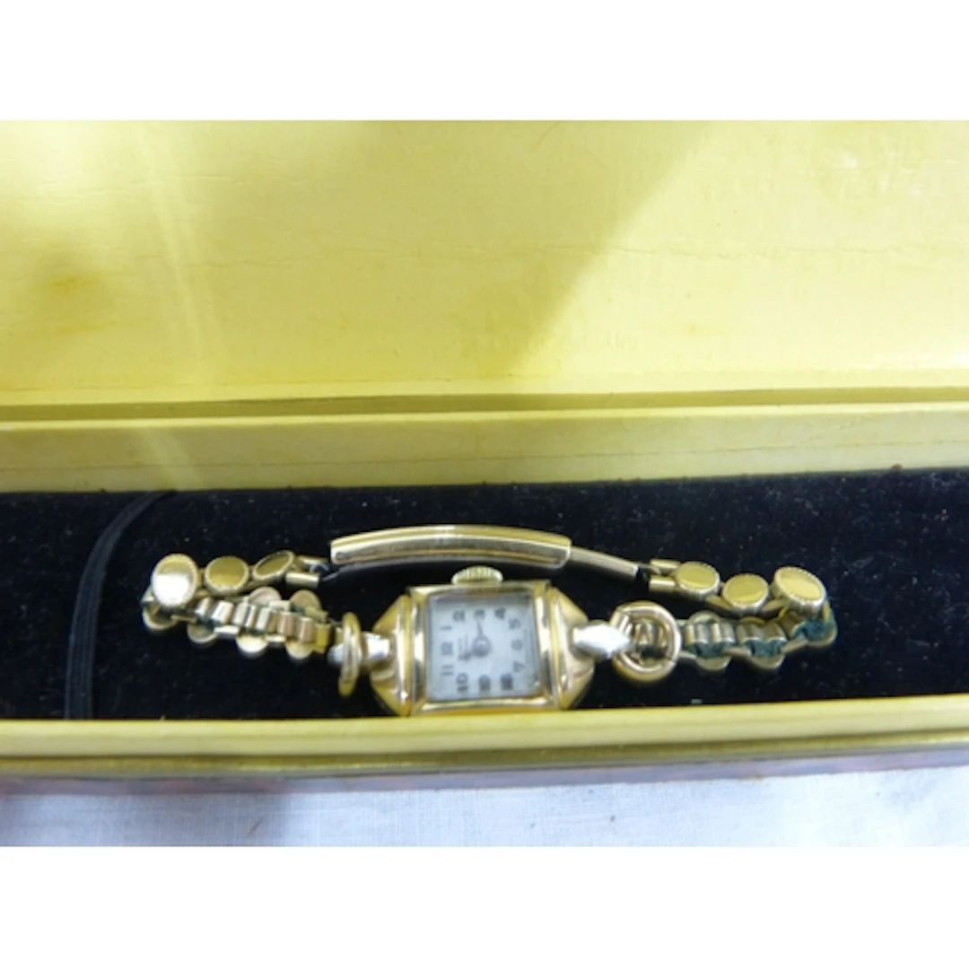 Small ladies rolled gold watch.