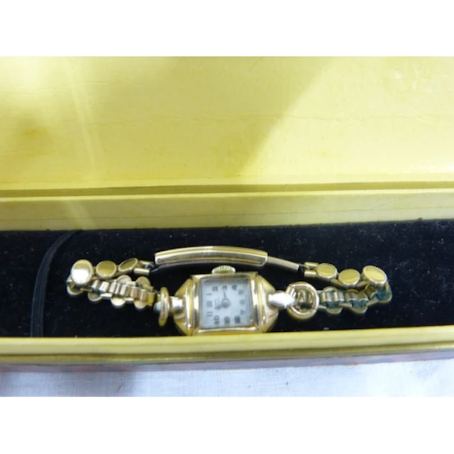 Small ladies rolled gold watch.