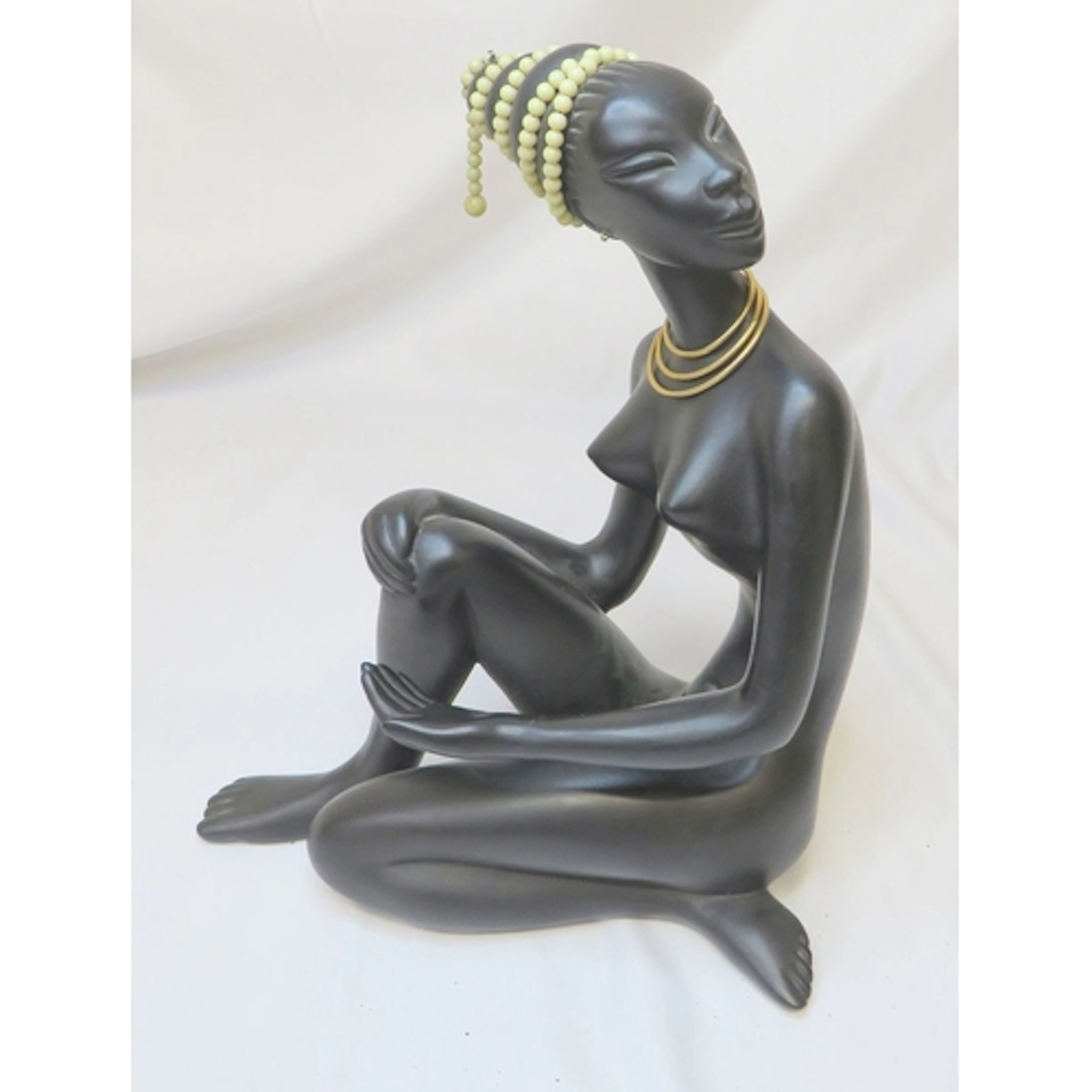 Mid Century Style Figure African Woman, seated with beads to...