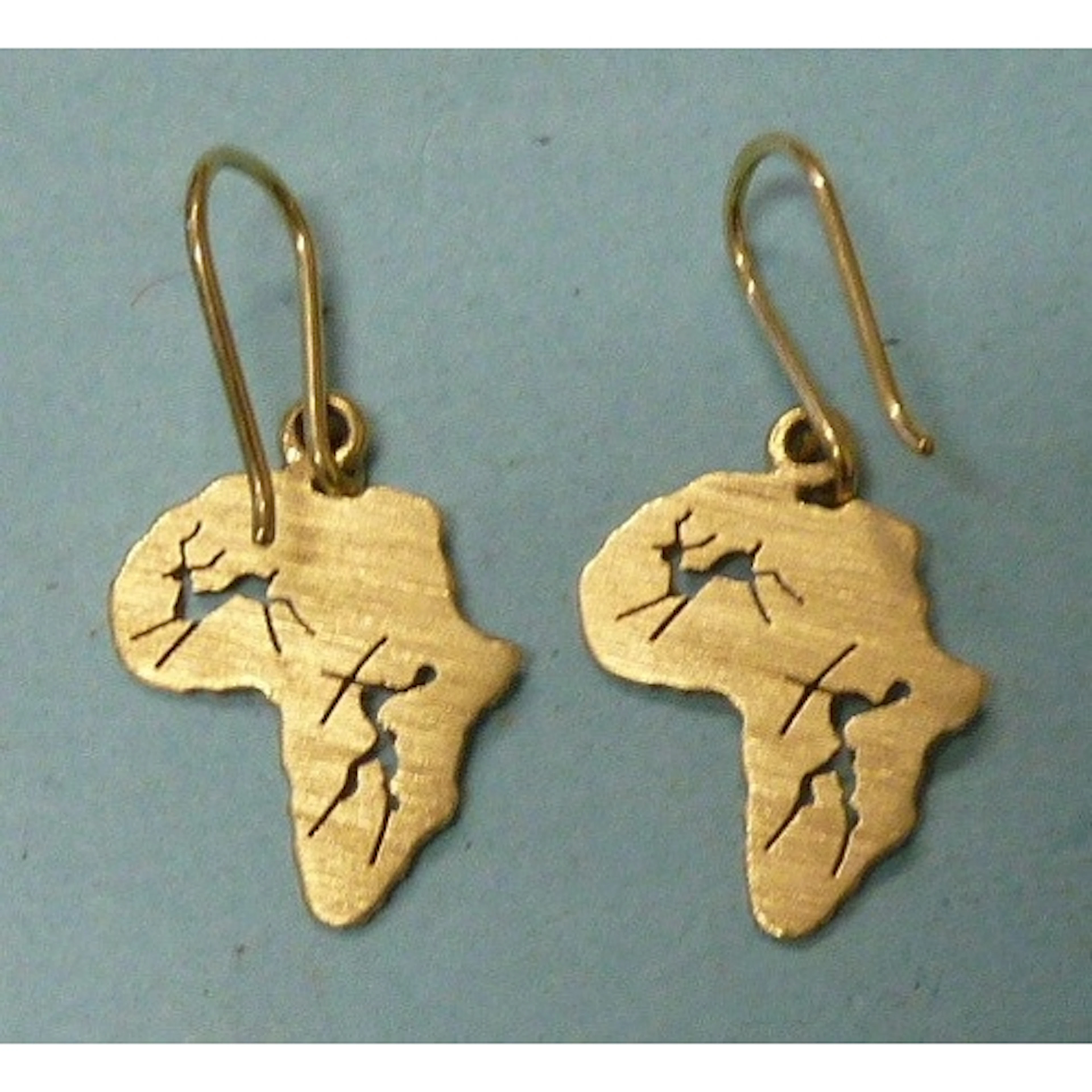 A pair of 14ct yellow gold earrings in the form of the conti...