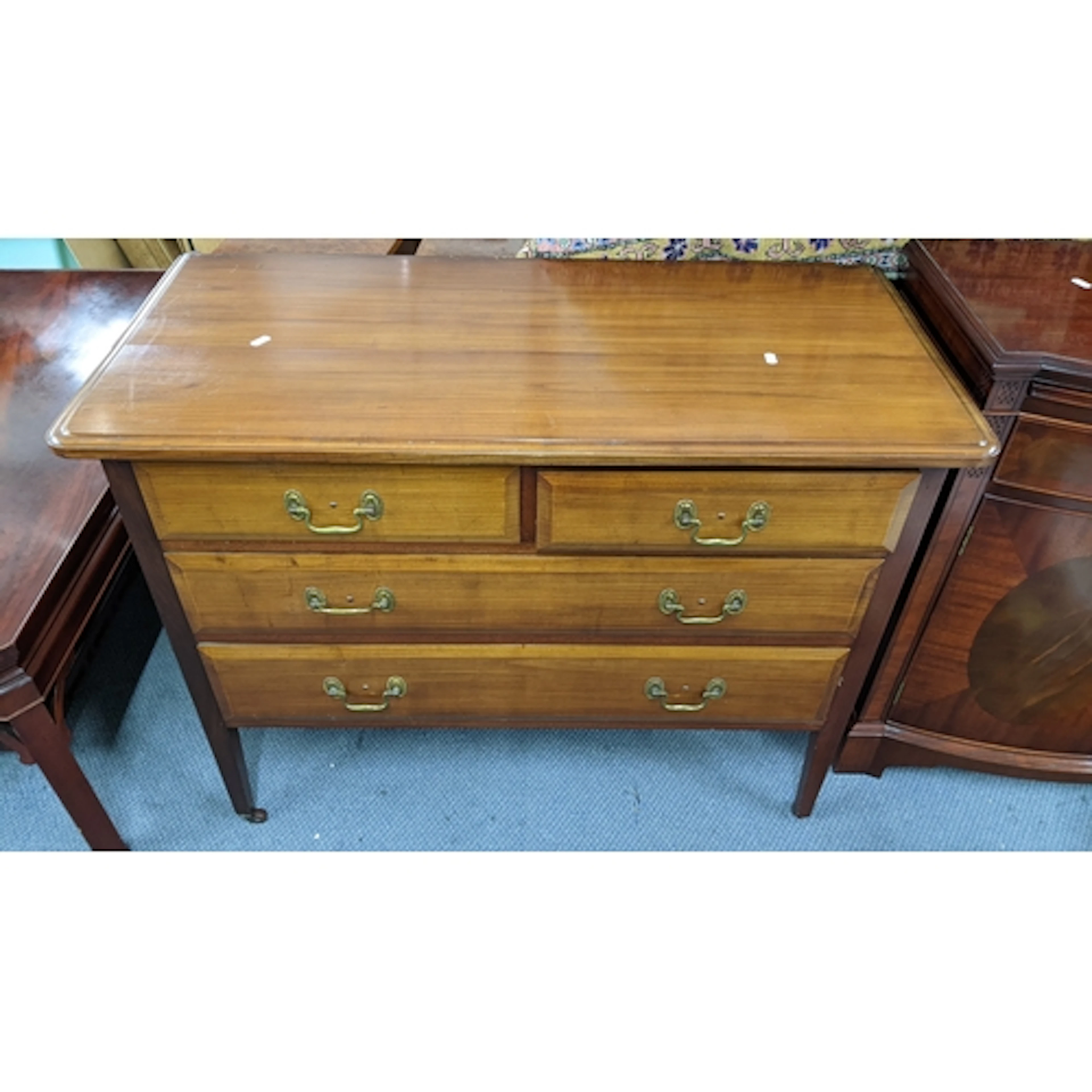 A reproduction dressing table/chest having two short and two...