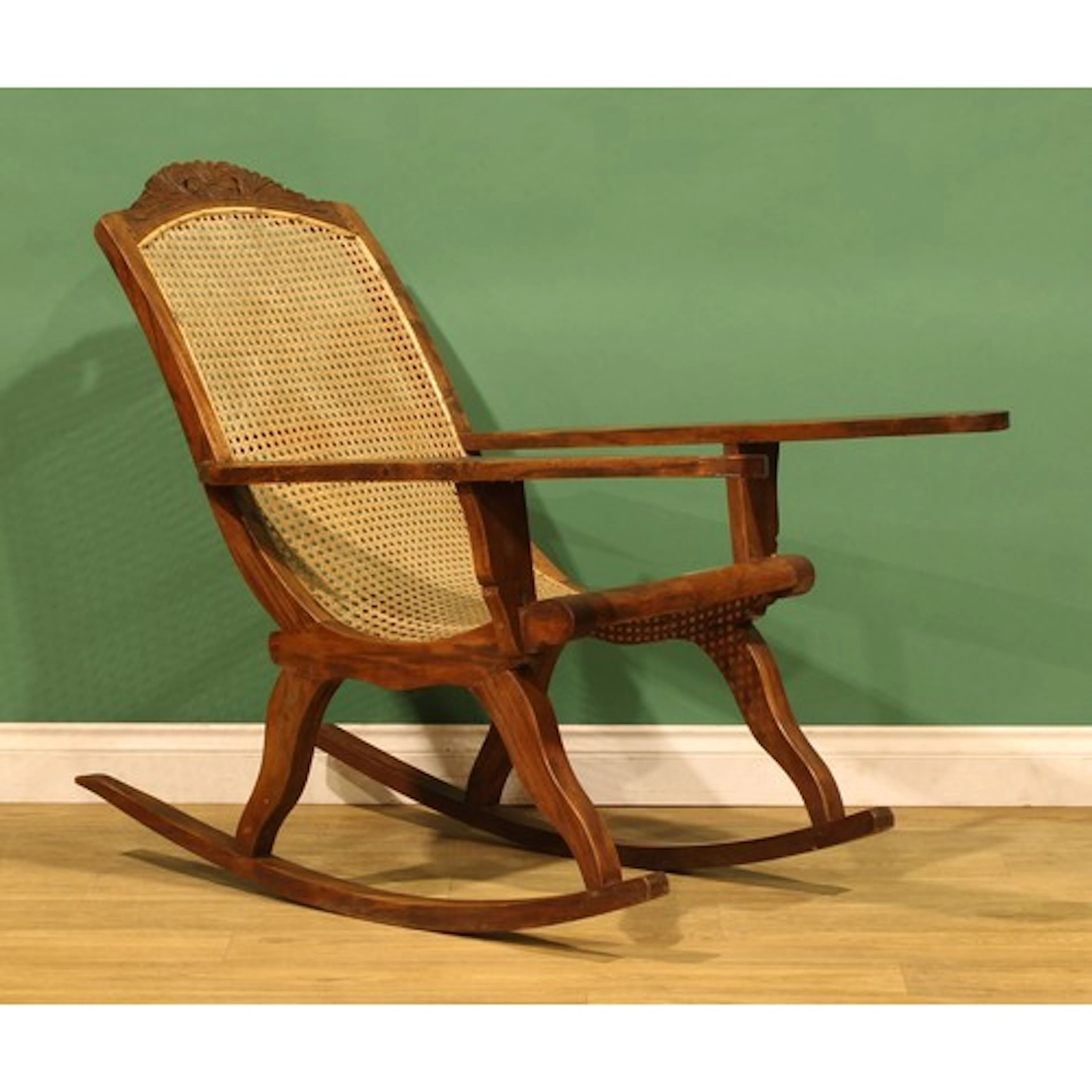 An Anglo-Indian/Ceylonese hardwood plantation rocking chair,...