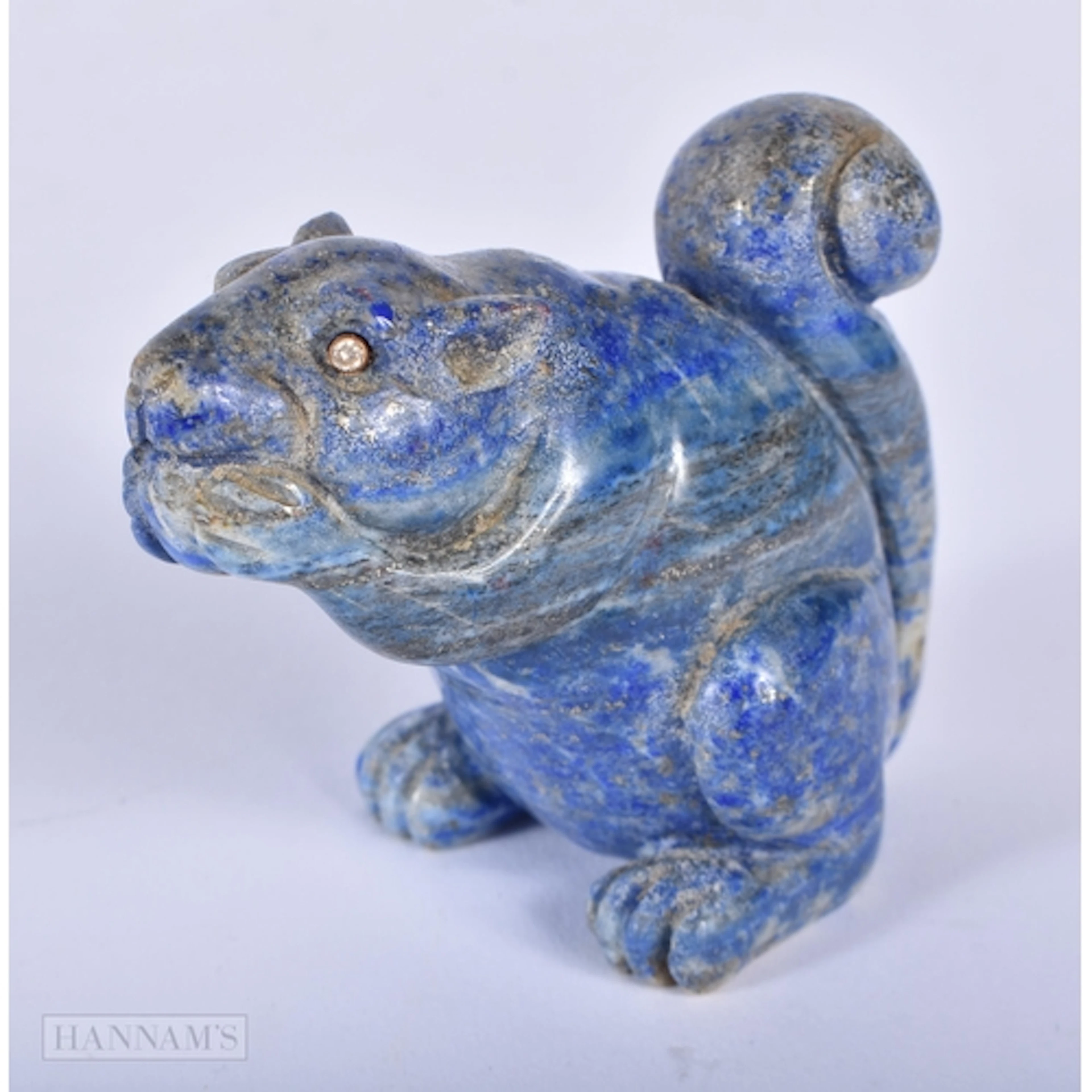 A German lapis lazuli squirrel carving with diamond eyes ori...