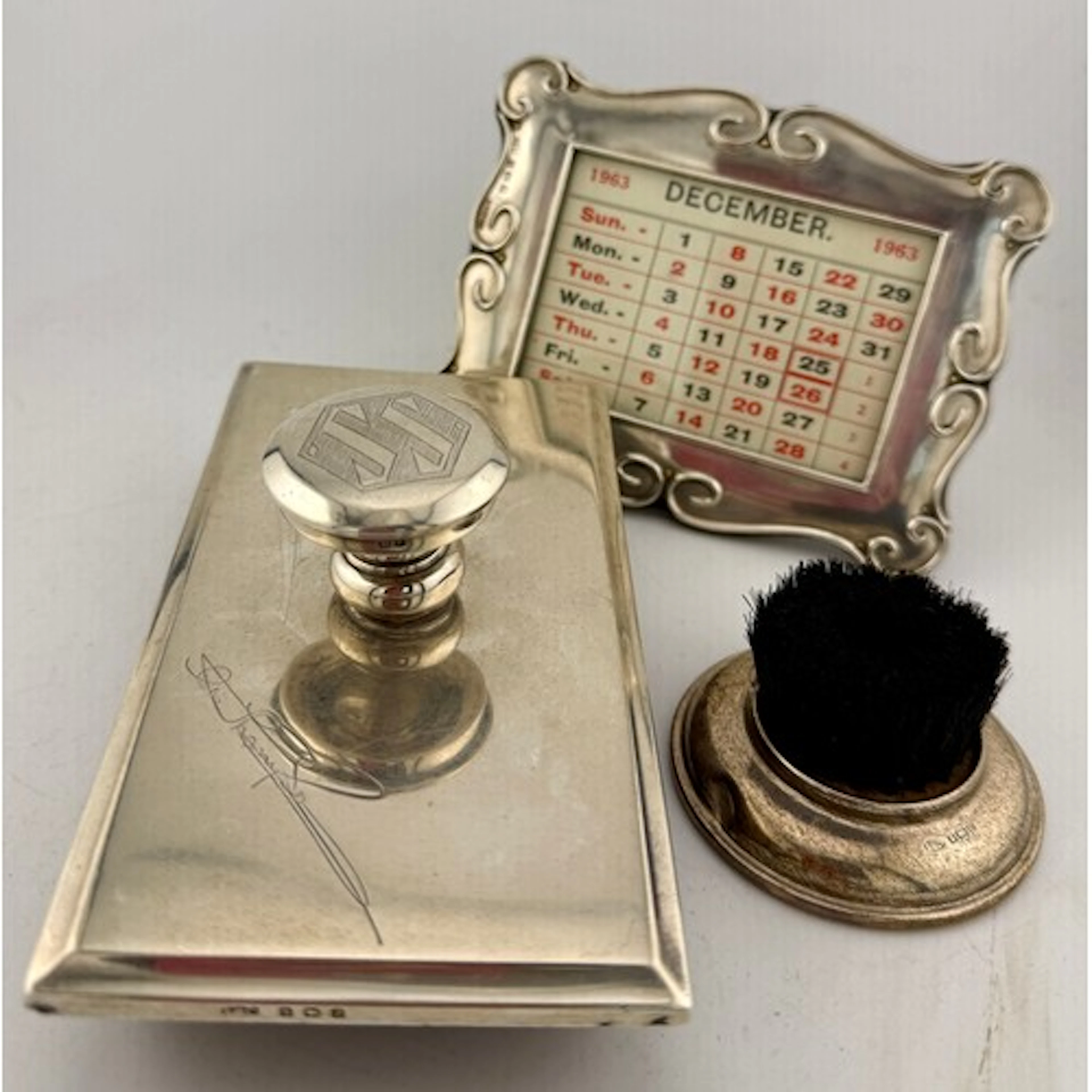A hallmarked silver blotter, Birmingham 1933, silver mounte...