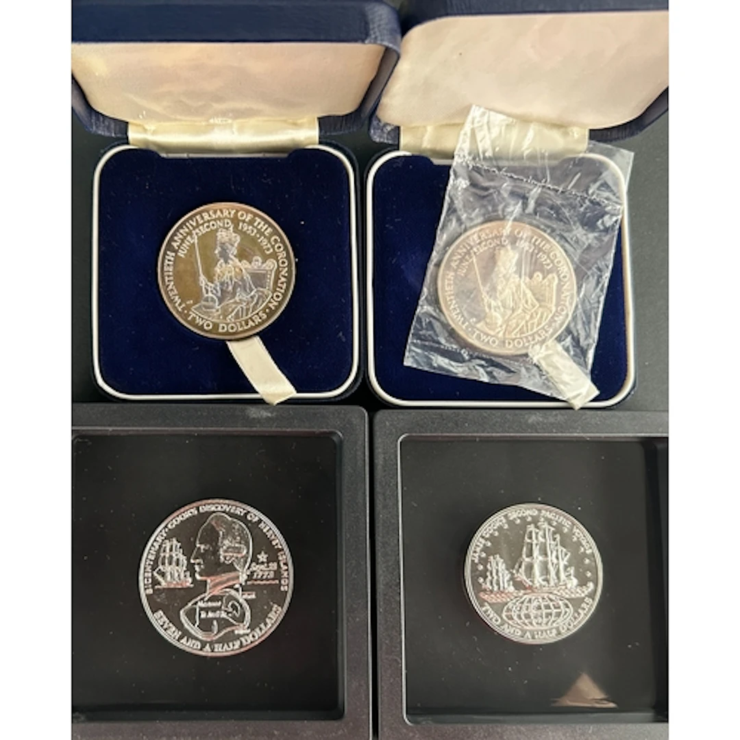 A group of nine Cook Islands silver coins, comprising 1973 s...