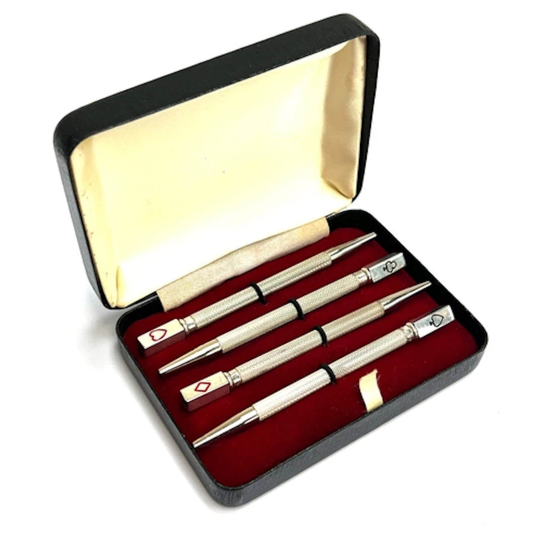 A cased set of vintage sterling silver playing card/bridge p...