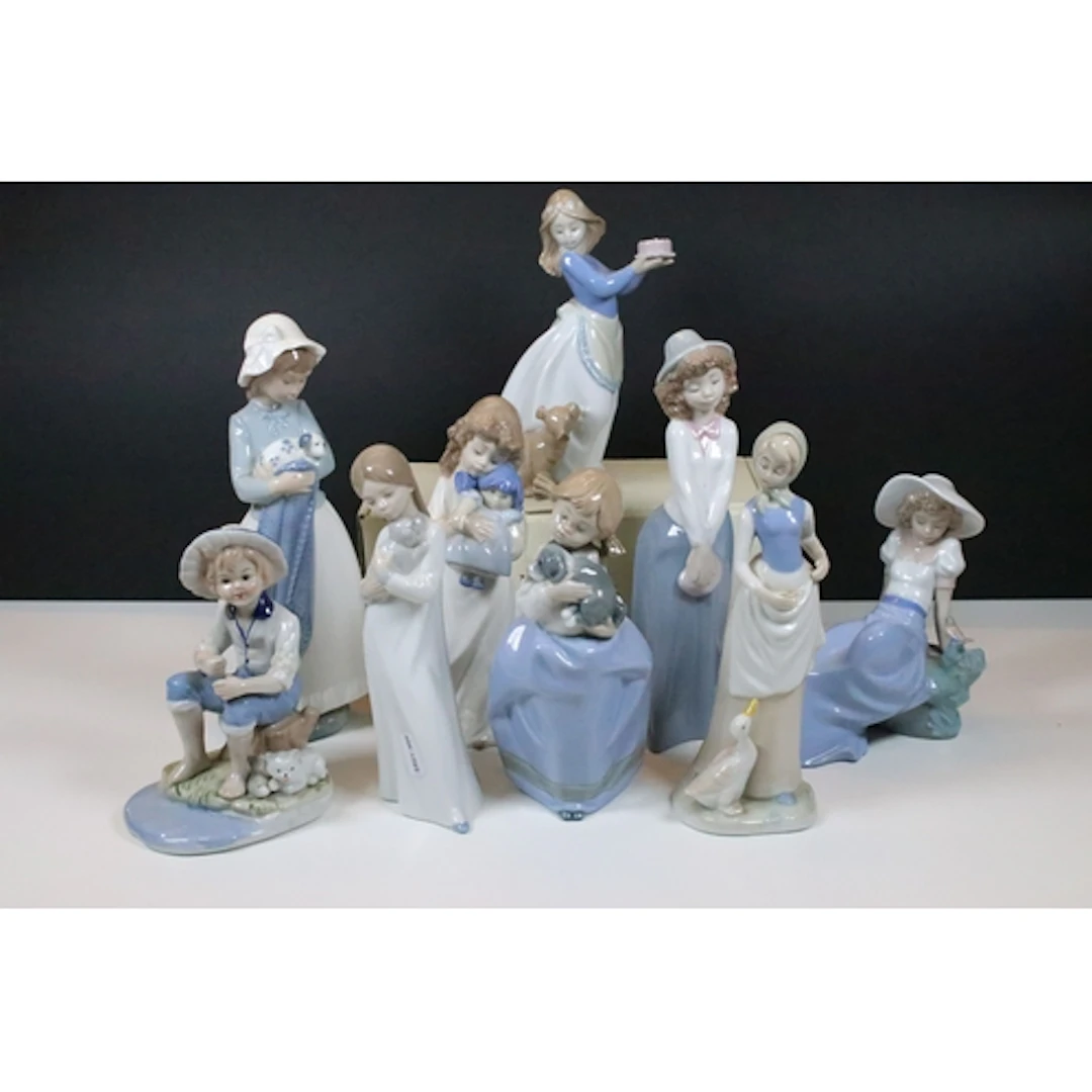 Collection of Nao figures, to comprise Puppy's birthday, box...