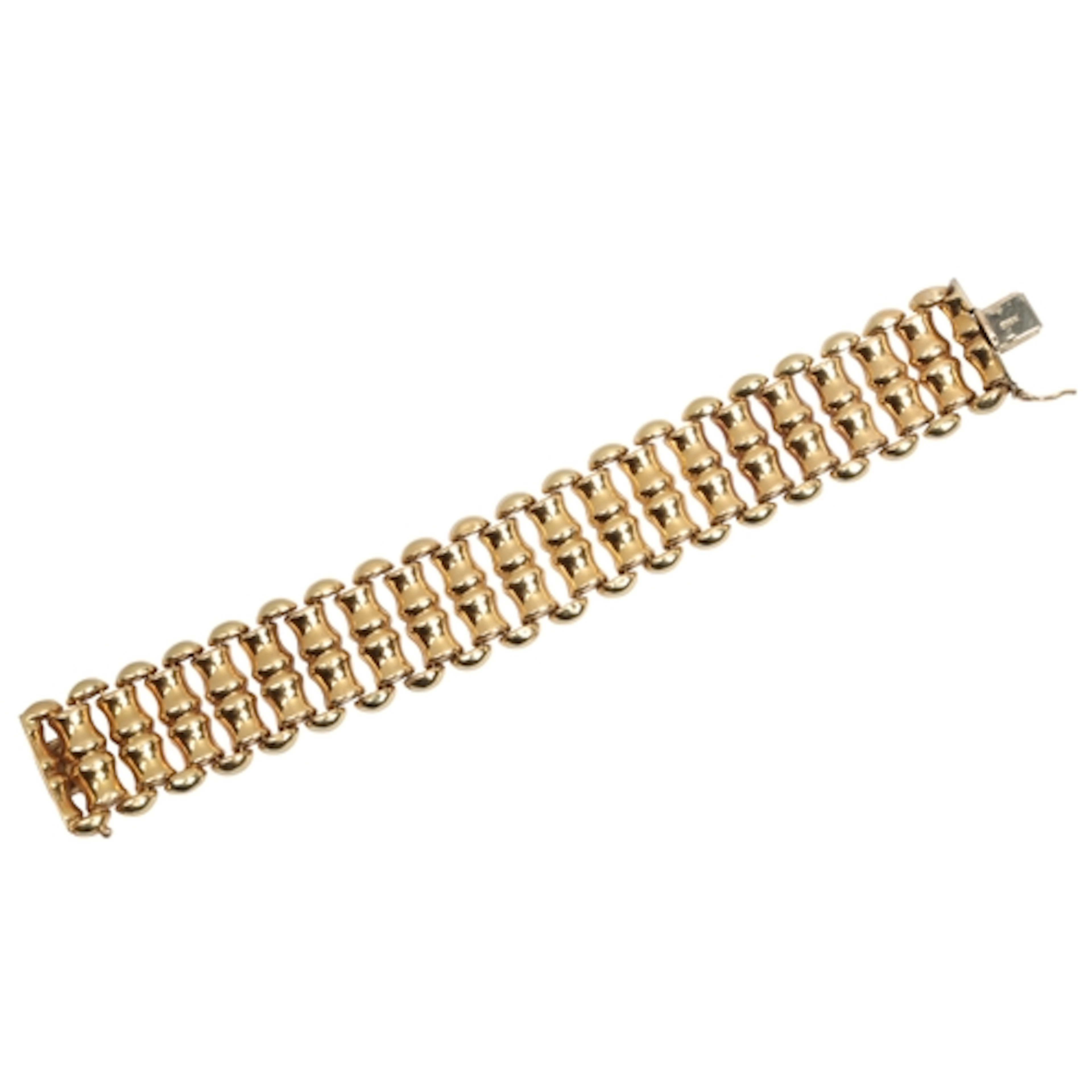 Unoaerre, a gold bracelet, Italy, composed of bamboo-style l...