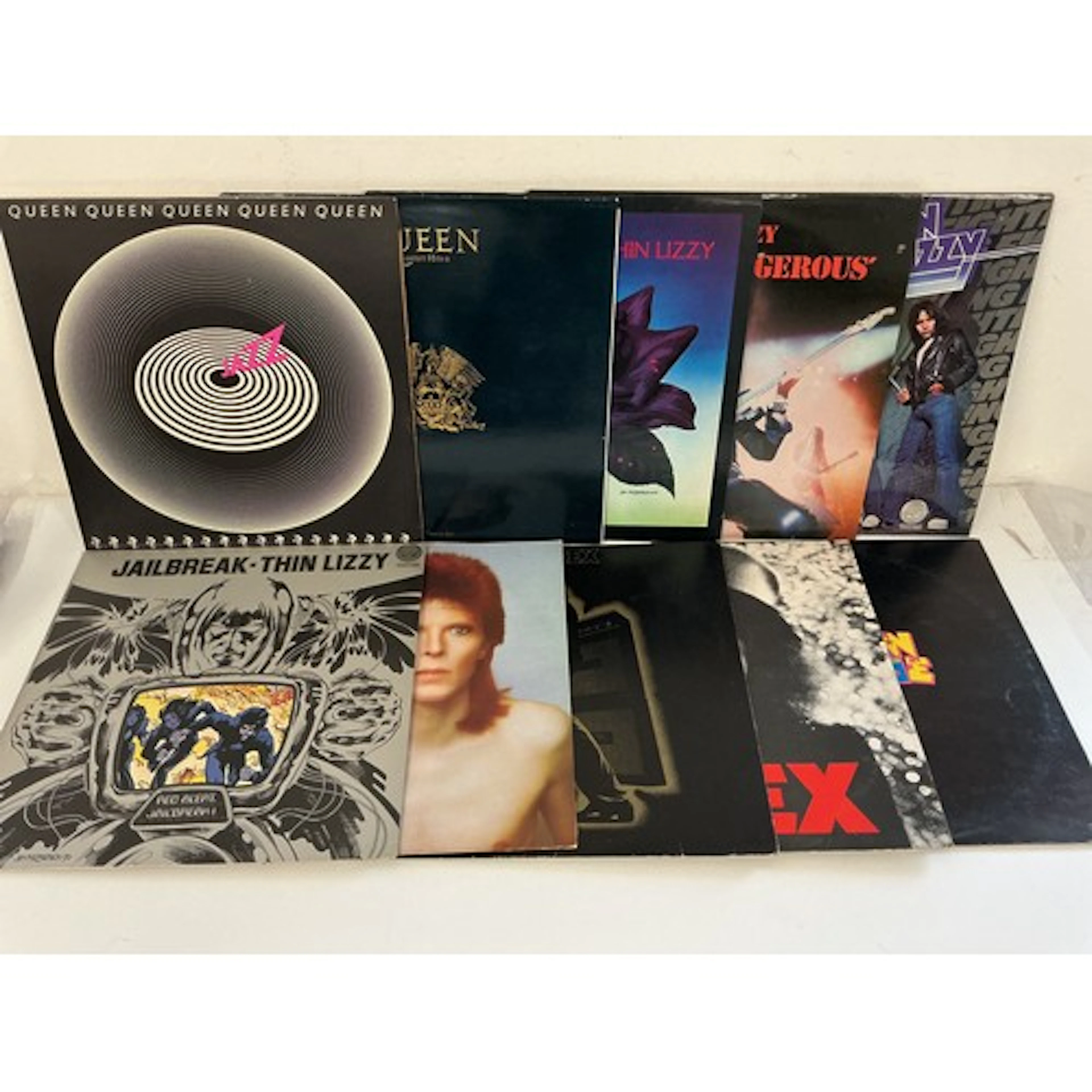 Ten rock LPs by Queen, David Bowie, T Rex and Thin Lizzy.