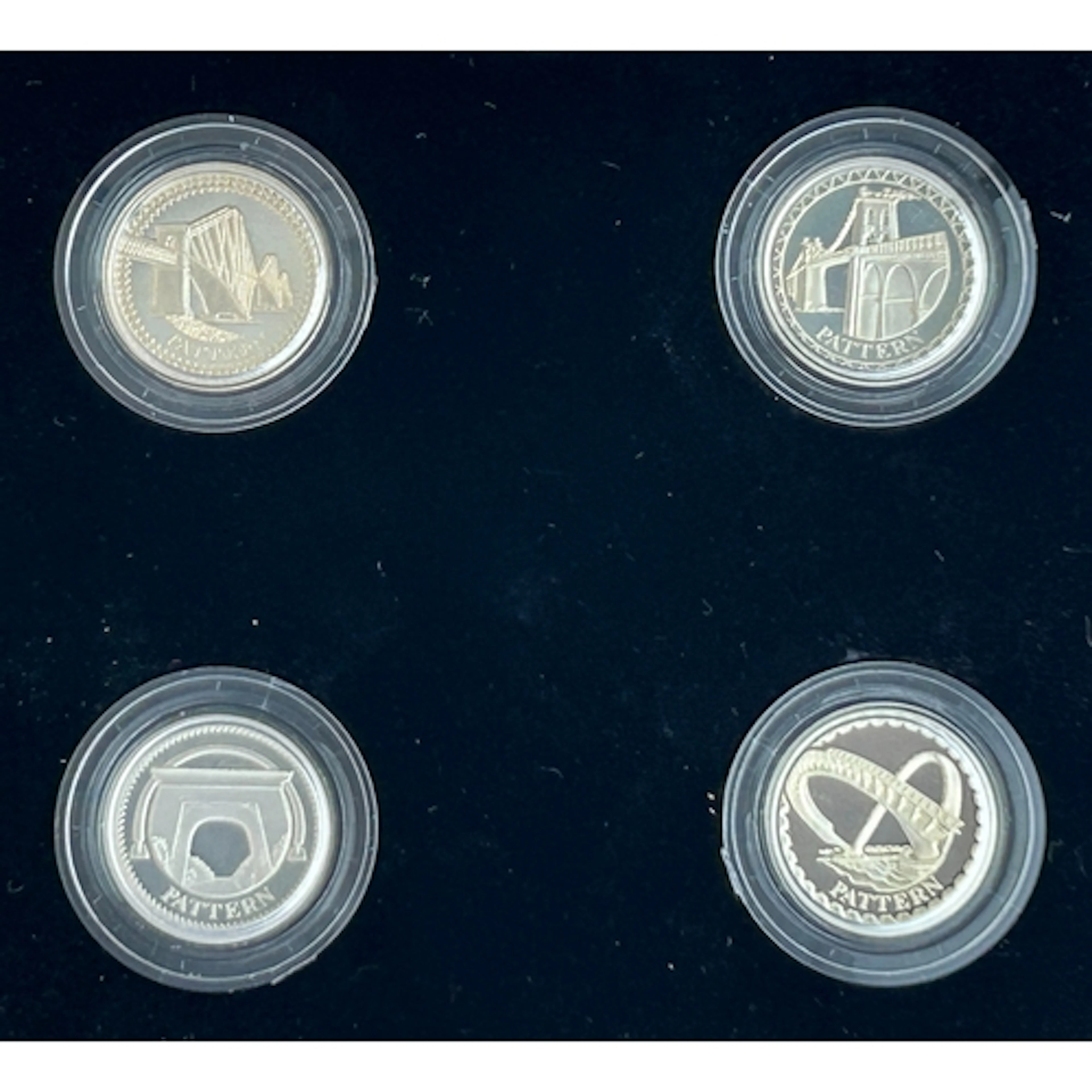 UK silver proof £1 four-coin pattern set, featuring designs ...