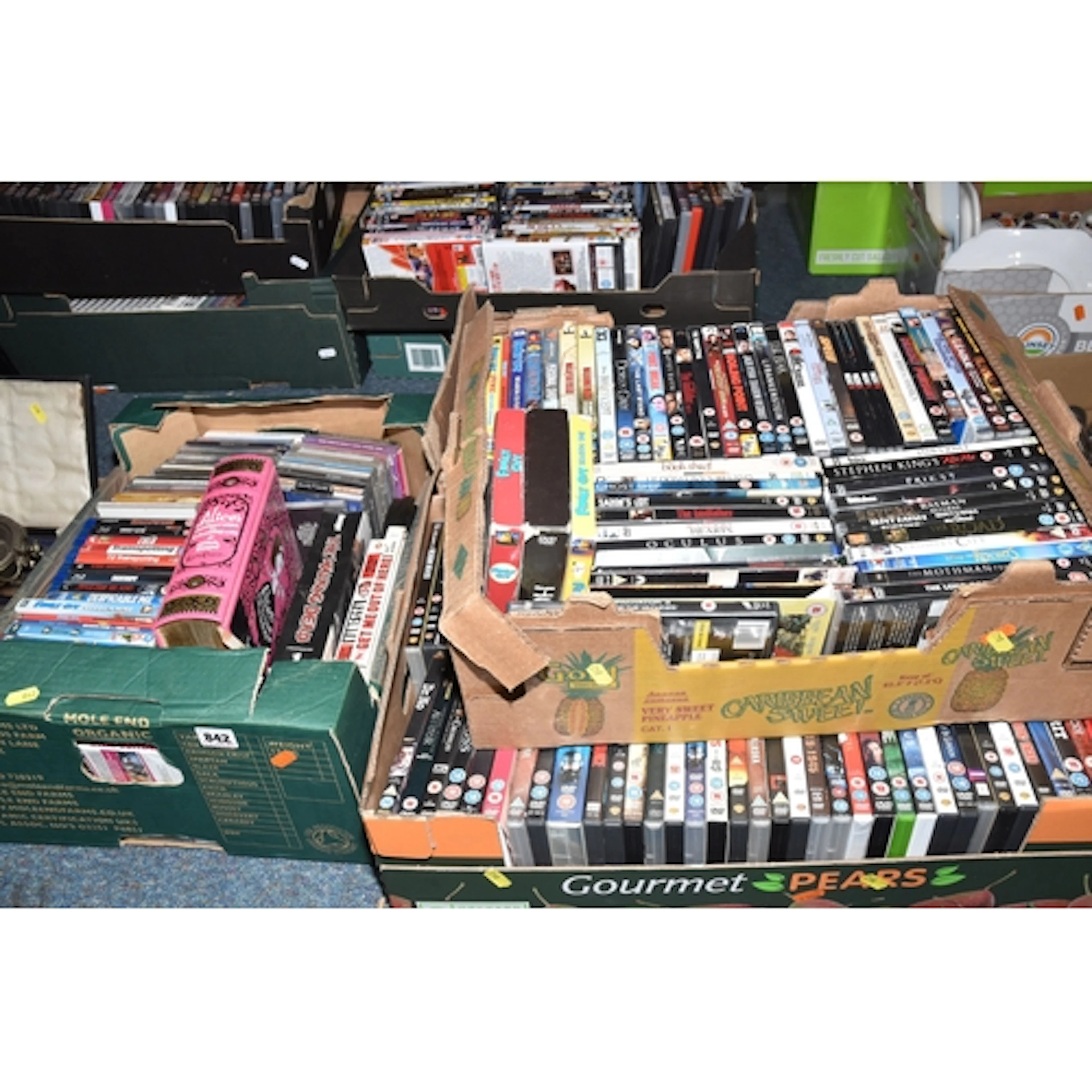 FOUR BOXES OF DVD'S ETC. to include mostly DVD's approximate...