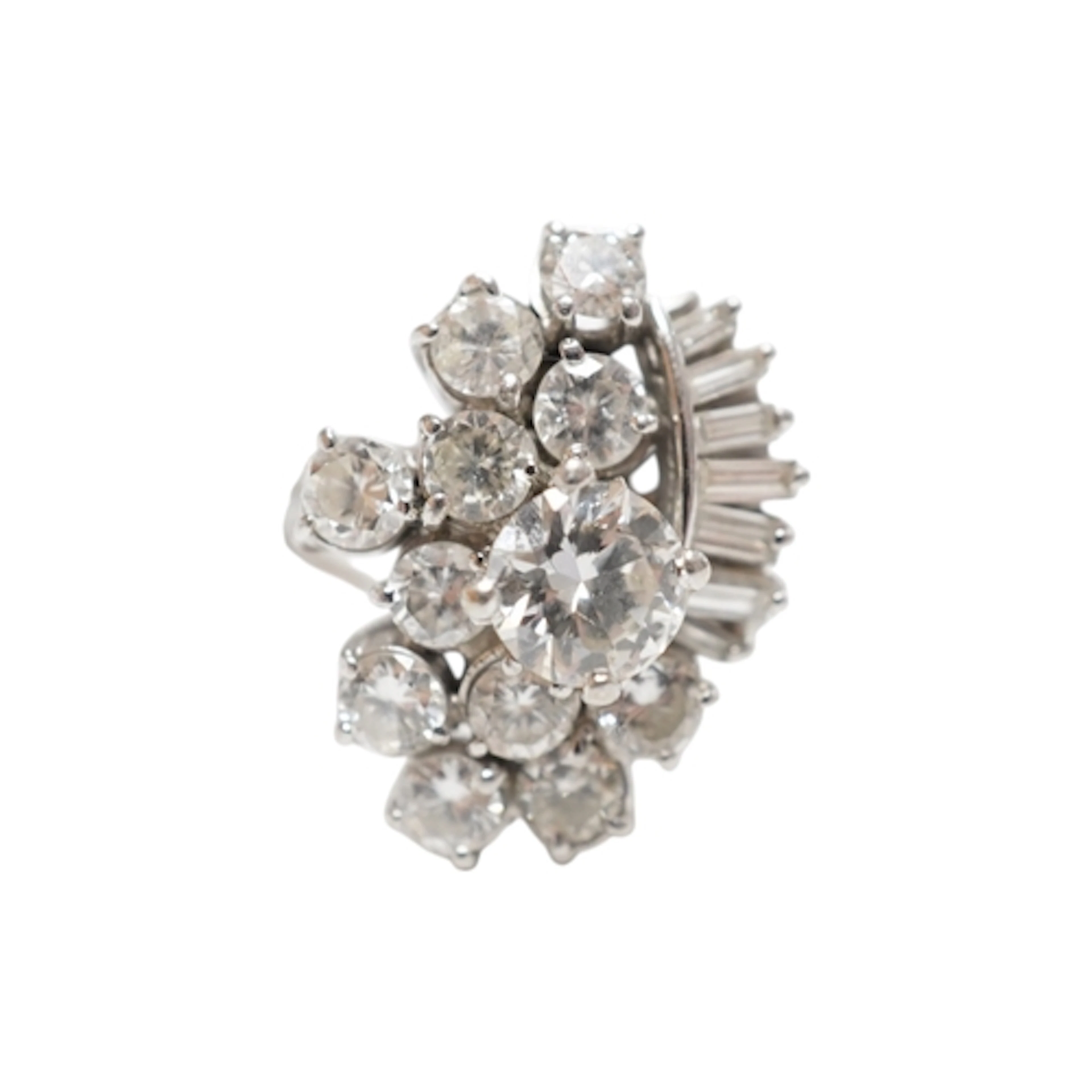 A diamond cocktail ring, 1970s, designed as an abstract clus...