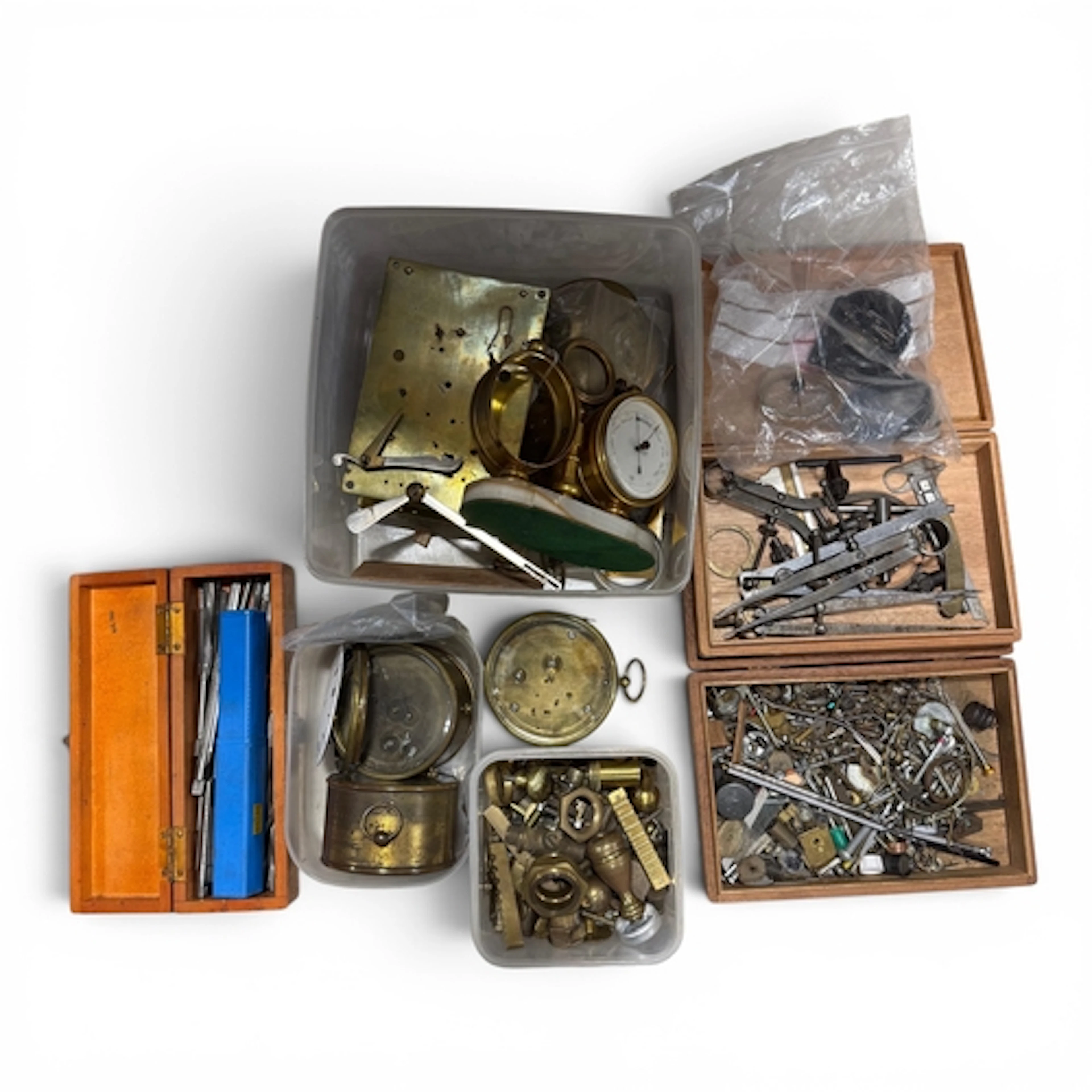 A COLLECTION OF CLOCK AND WATCH PARTS To include a carriage ...
