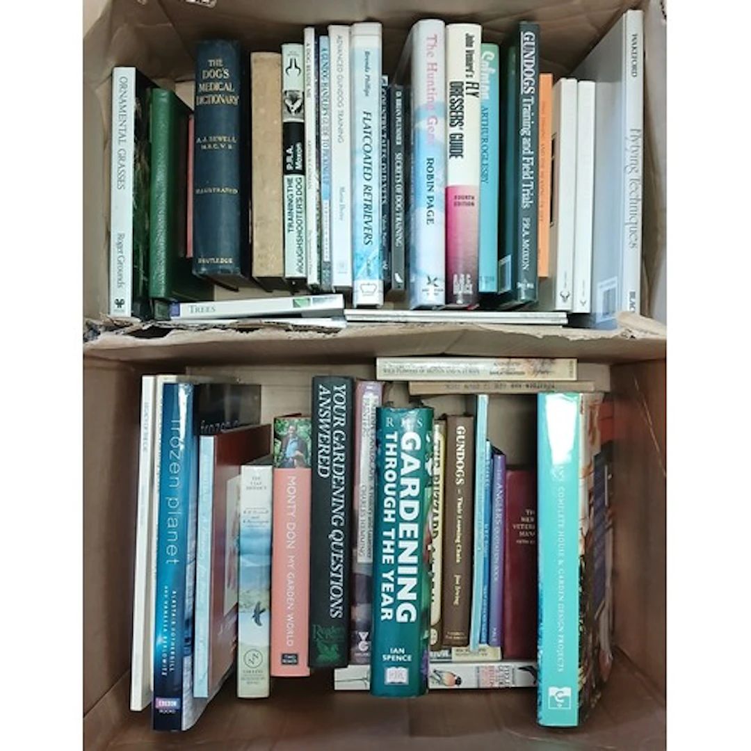 Two boxes of books to include gardening reference, geography...