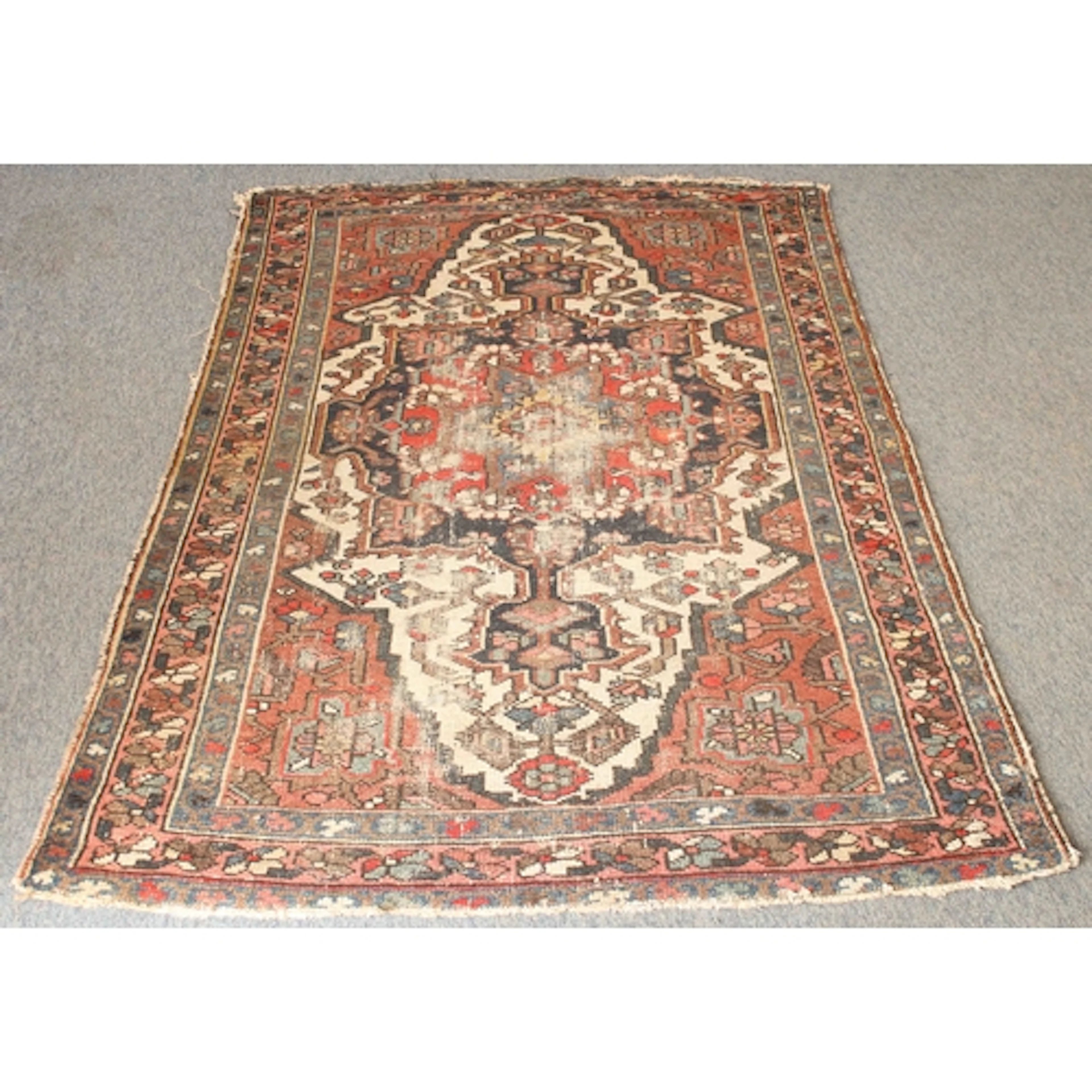 A Persian hand-knotted wool rug, probably Bakhtiari - early ...