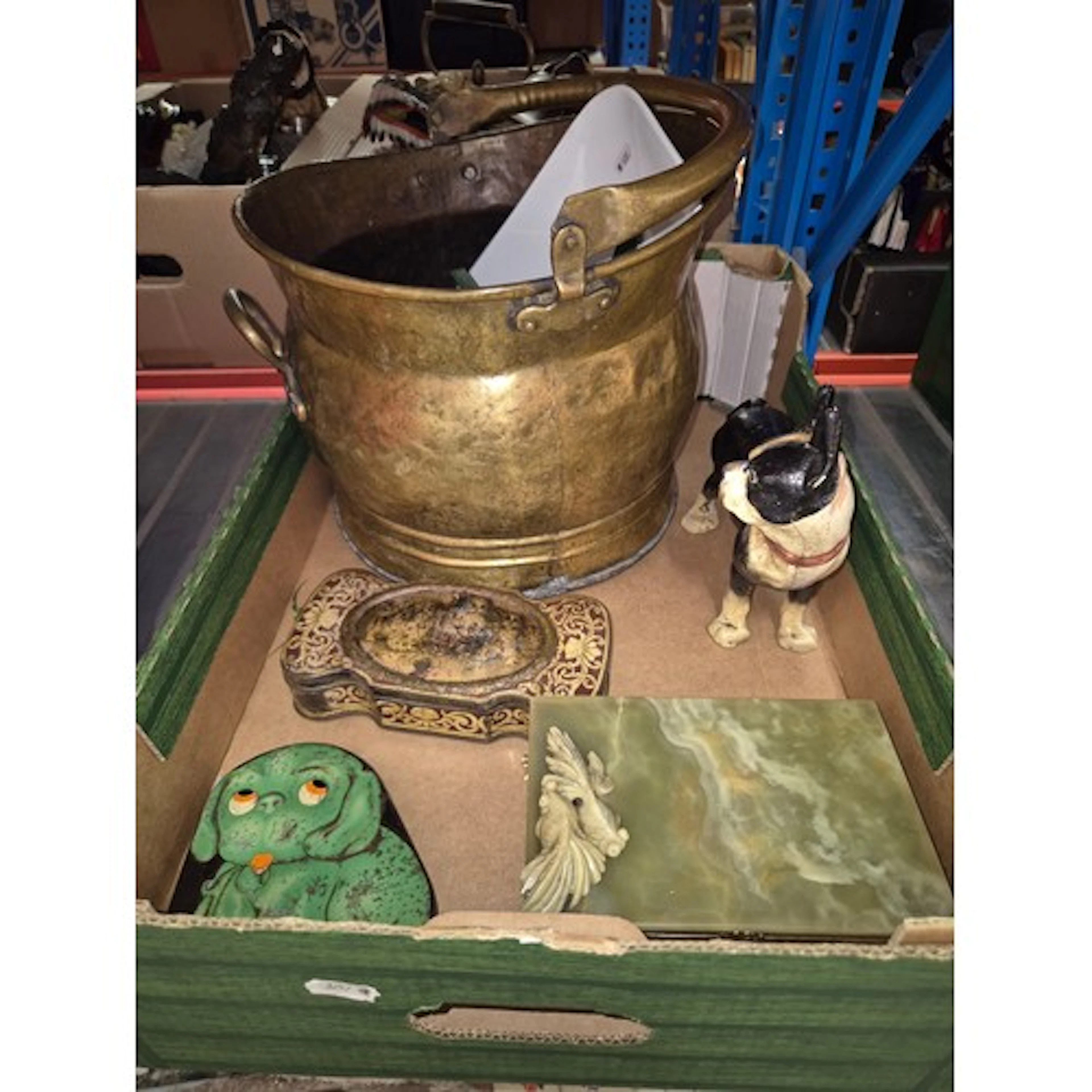 A brass bucket, a set of kitchen scales, a cast metal dog, t...