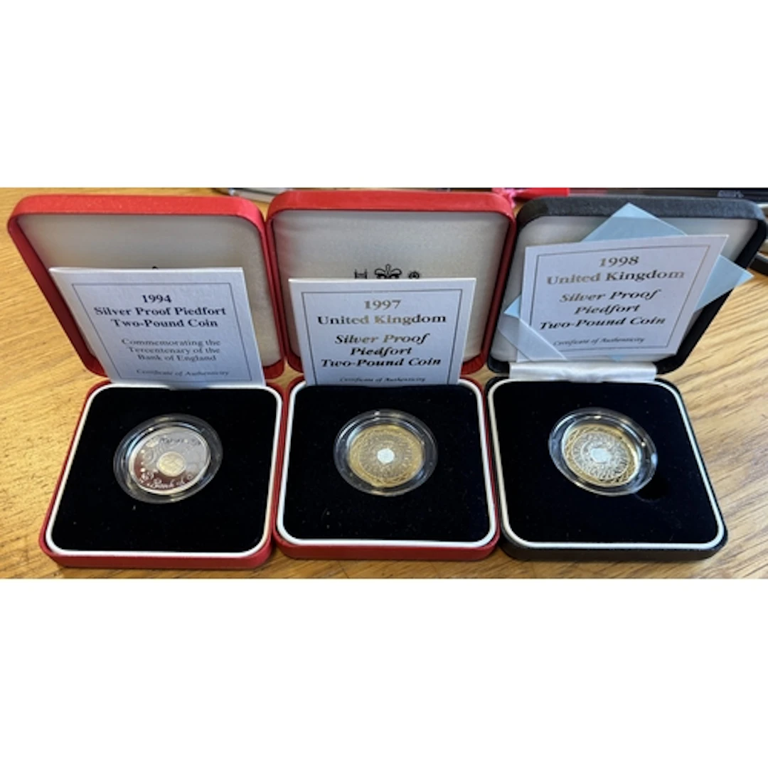 Collection of silver boxed proof £1 piedforts FDC, including...