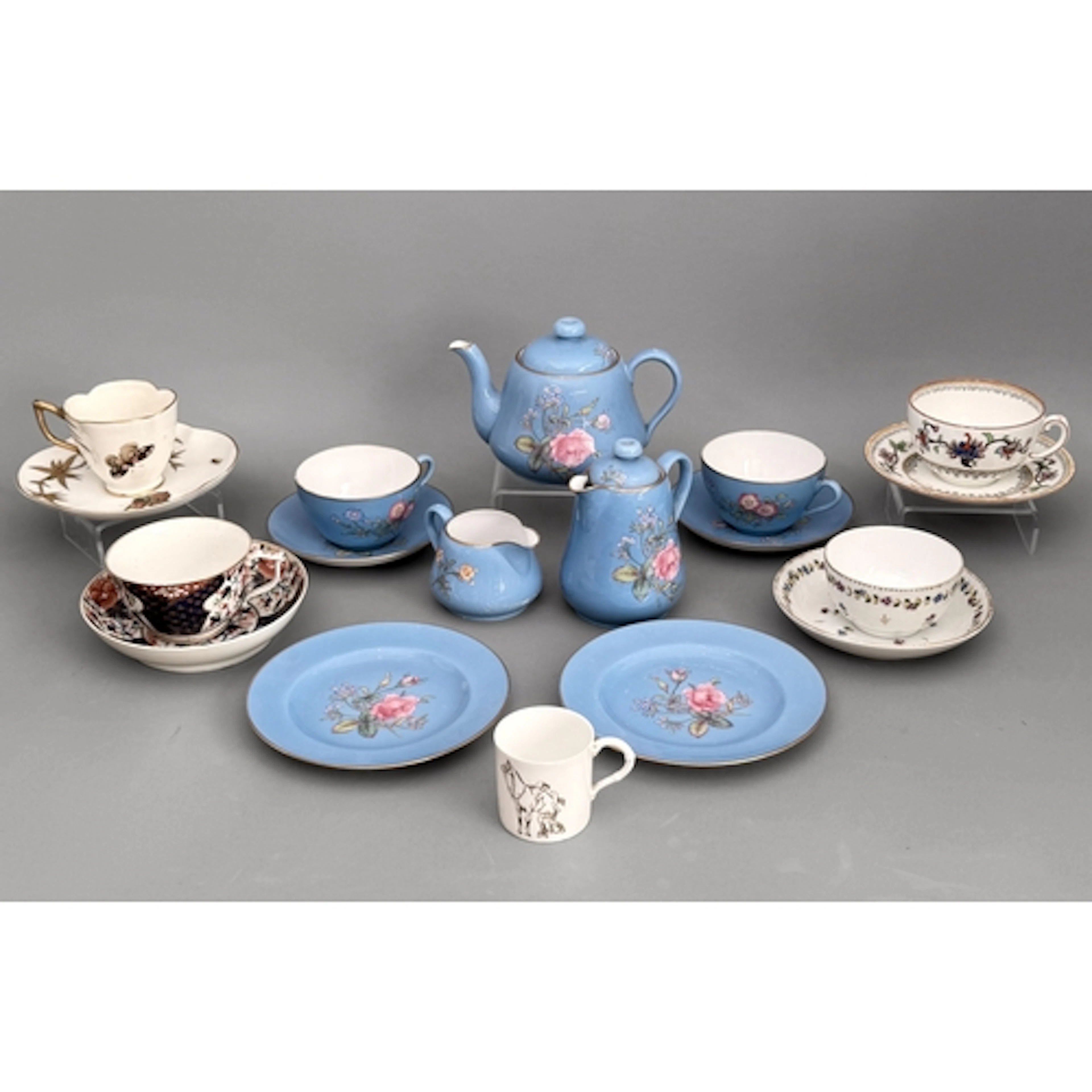 A Spode porcelain tea set - decorated with a pink rose desig...