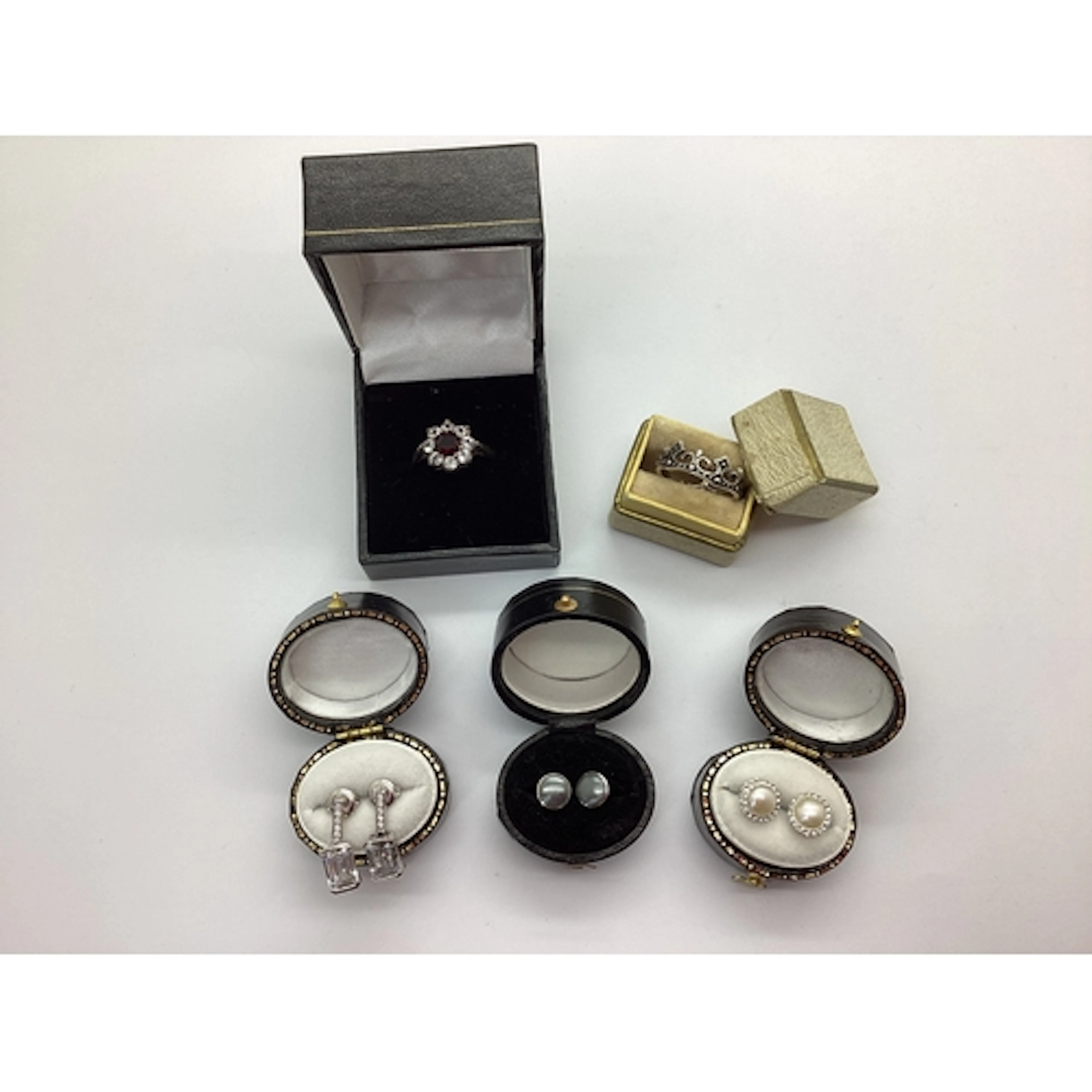A Hallmarked Silver Flowerhead Cluster Ring, claw set throug...