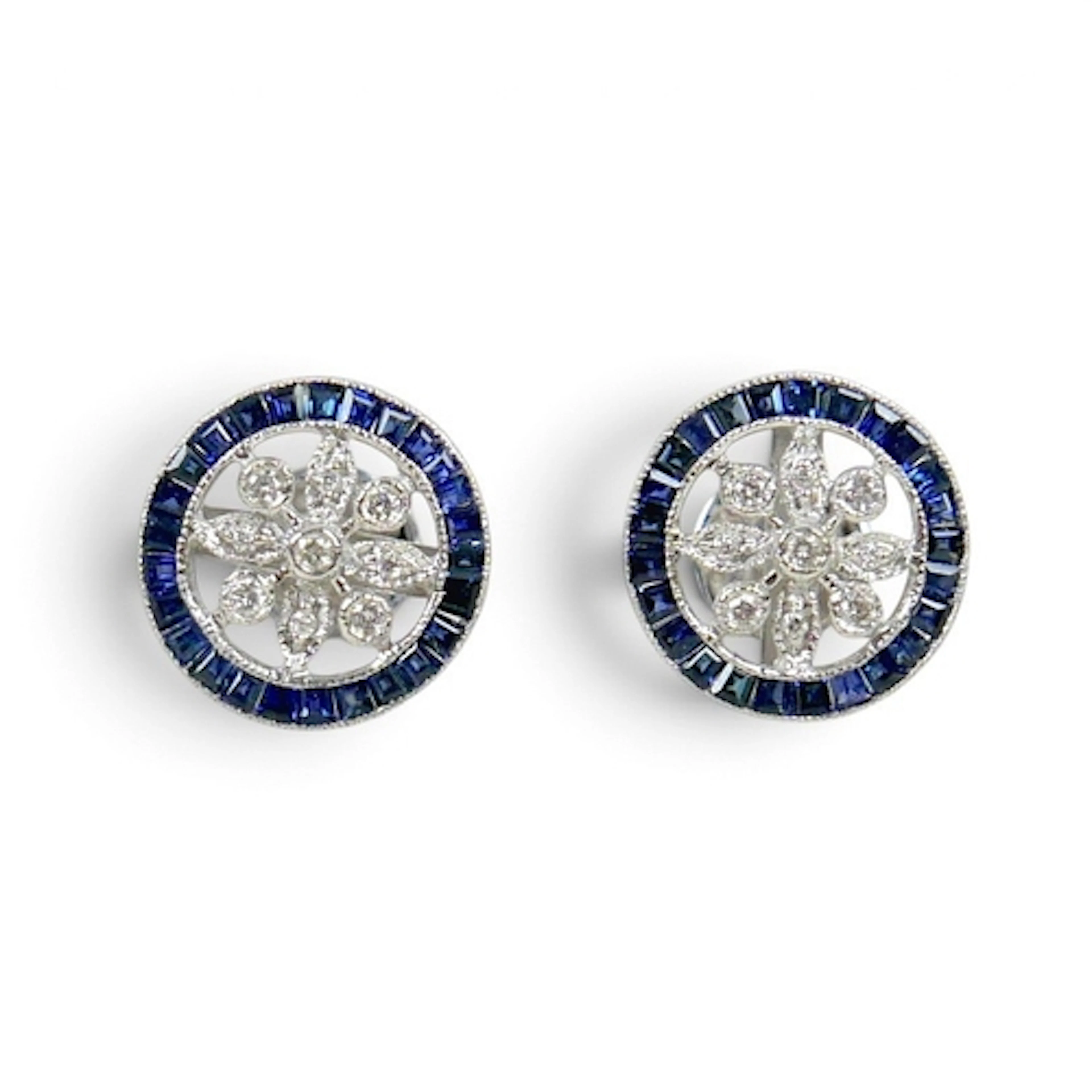 A PAIR OF 18CT WHITE GOLD DIAMOND AND SAPPHIRE CIRCULAR STUD...