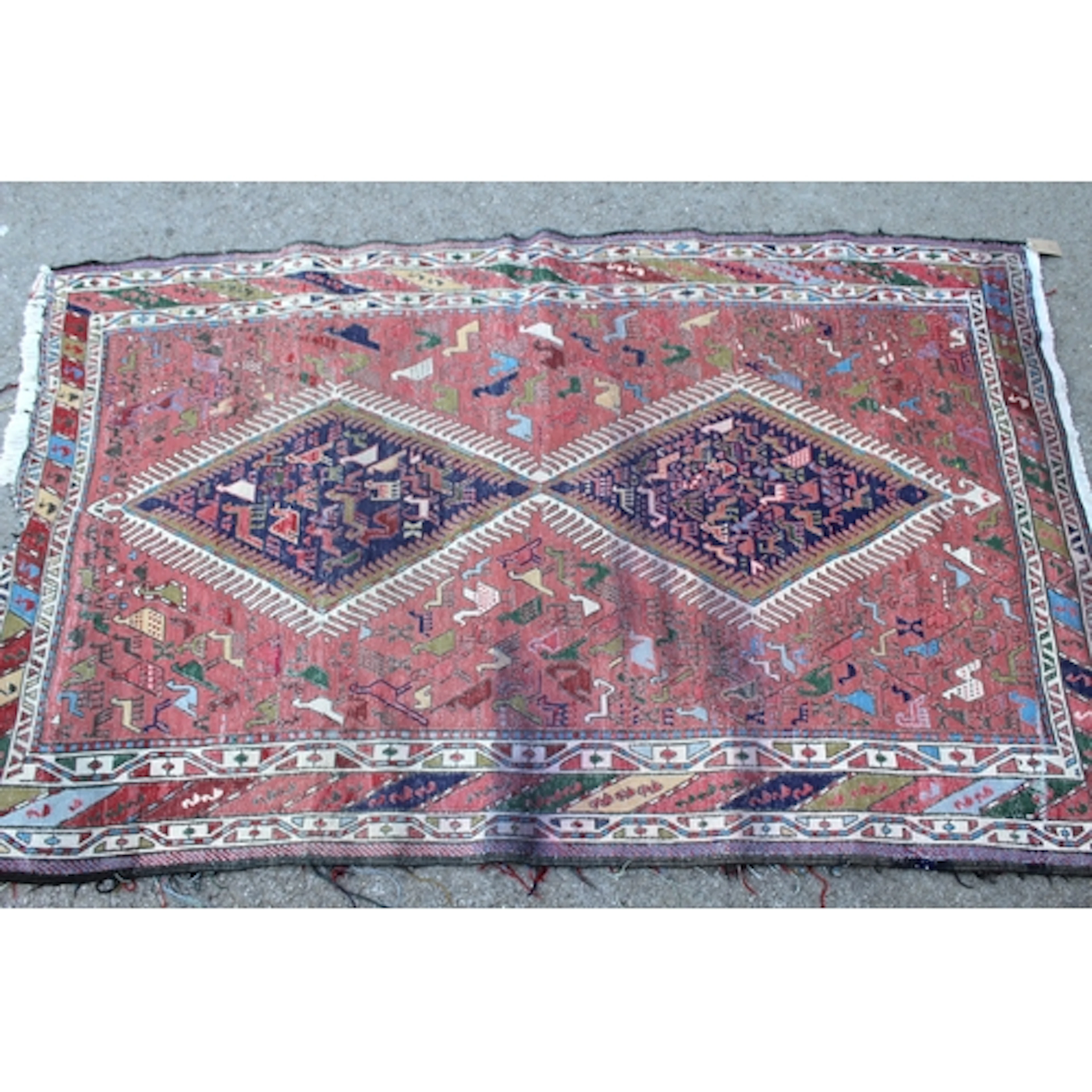 Soumak rug with two centre medallions and all-over animal de...