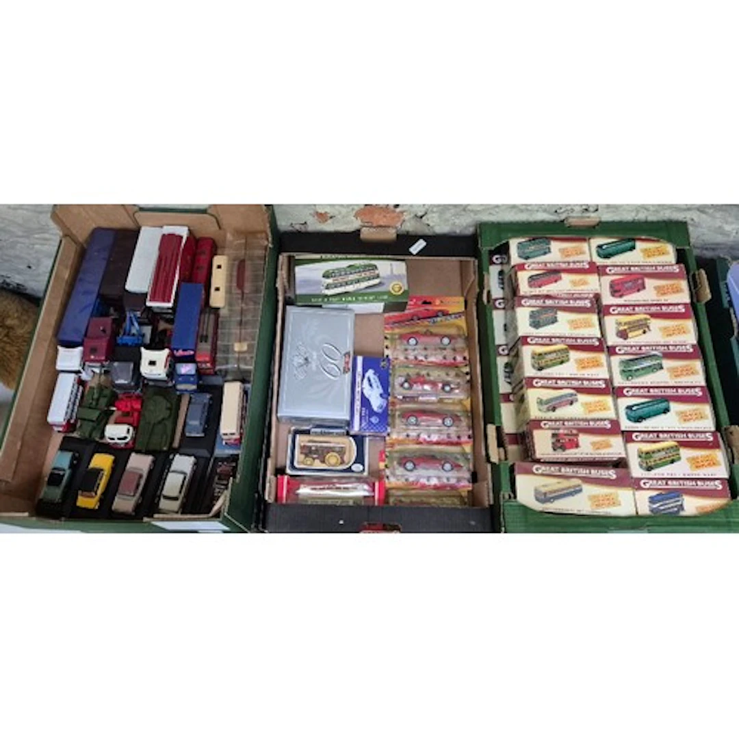 Three boxes of assorted diecast model vehicles to include Di...