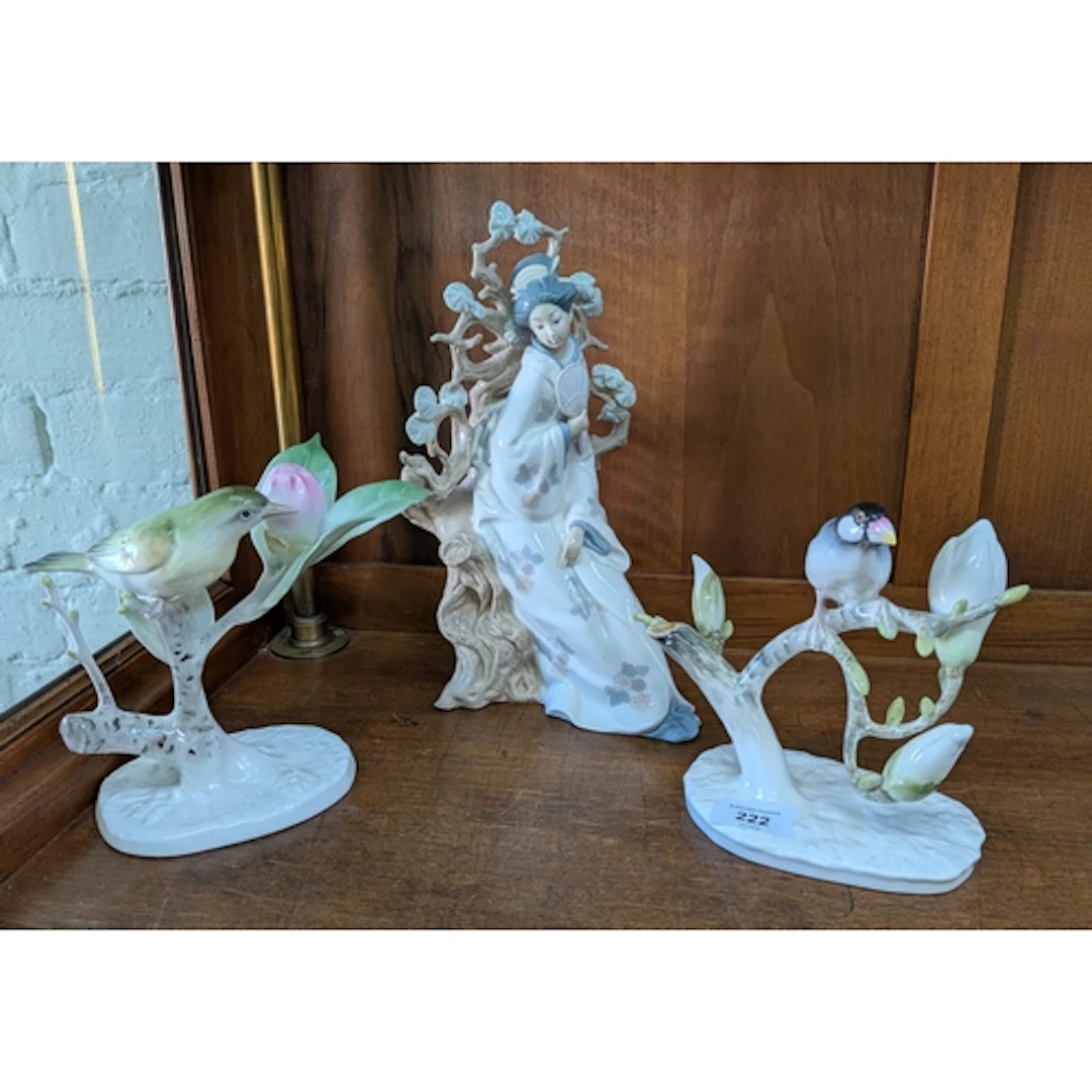 A Lladro figurine of a Japanese lady, numbered D29N, and a p...